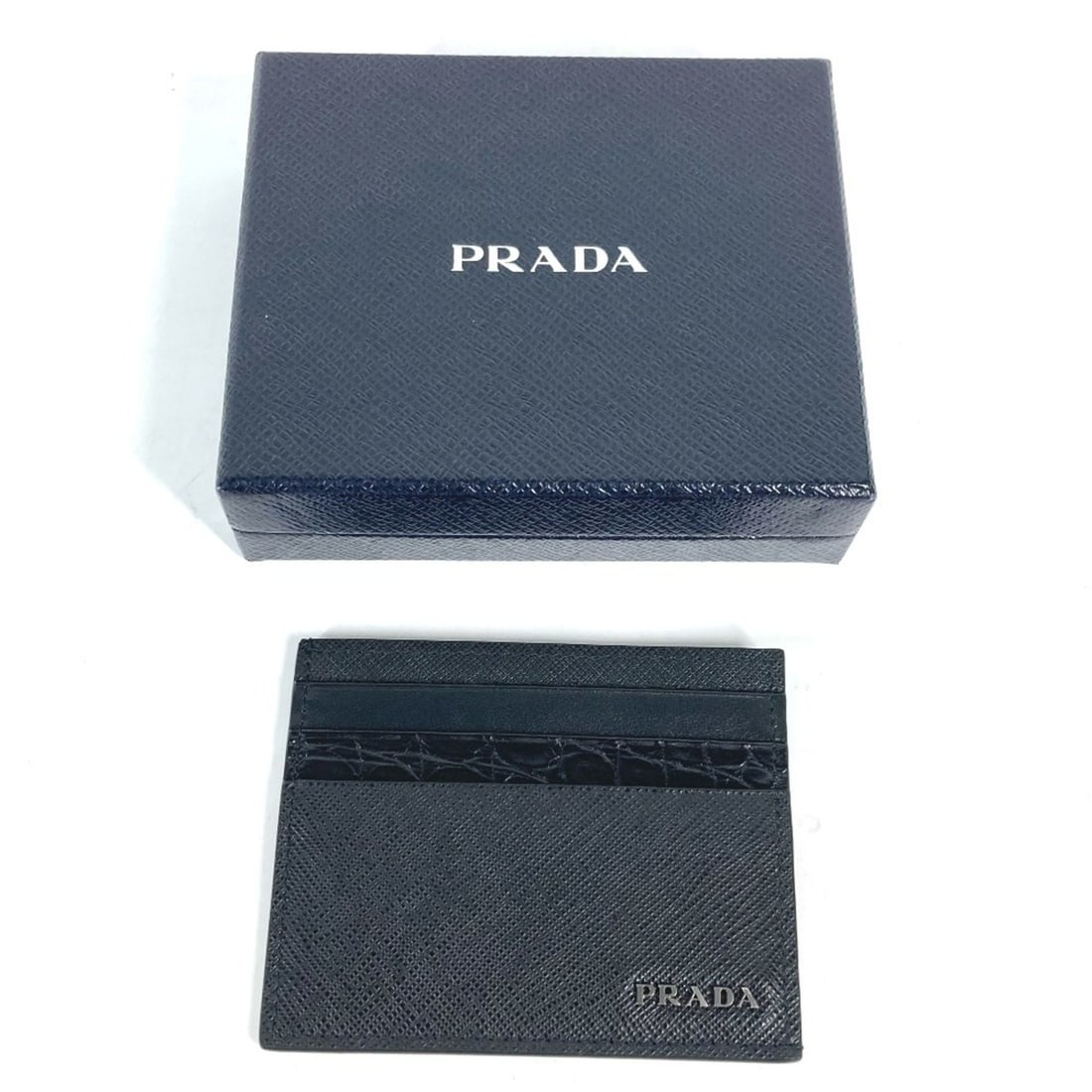 PRADA 2MC223 Business Card Holder, Pass Case, Saffiano Leather, Men's, Black, E-240403-16: --- Catalog ---Category: DesignType: Card caseColor: BlackGender: Men,WomenMaterial: Leather Leather/Fur Type: Saffiano leatherCategory: GeneralBrand: PradaCategory: Physical PropertiesSize (HxWxD): 8