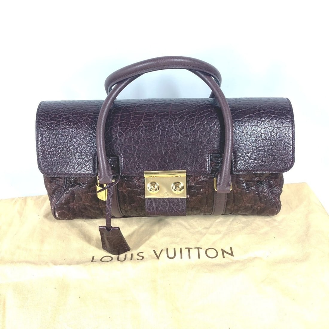 LOUIS VUITTON M93474 Monogram Volupte Botte Tote Bag Flap Handbag Coated Canvas Leather Women's: --- Catalog ---Category: SizeSize (HxWxD): 20cm x 33.5cm x 11.5cm / 7.87'' x 13.18'' x 4.52''Category: DesignType: Handbag, Tote bagColor: PurpleGender: WomenMaterial: Coated canvas , Leather Category