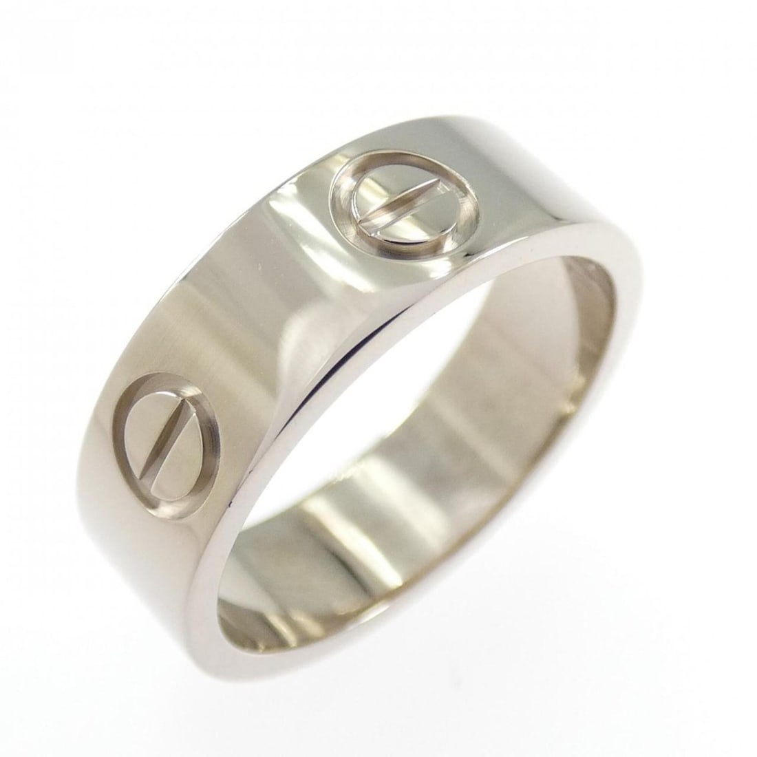 Cartier Love Ring: --- Catalog ---Category: SizeUS Size: 5.5Brand Size: 50Category: DesignType: Band ringGender: WomenMaterial: White gold (18K)Category: GeneralMPN: B4084700Brand: Cartier--- Item List ---Section: Condi