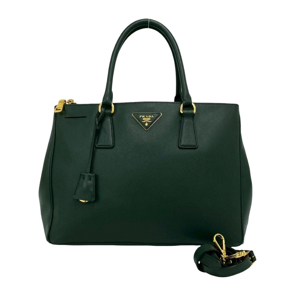 PRADA Triangle Logo Plate Hardware Leather Genuine 2-way Shoulder Bag Handbag Tote Green 85729: --- Catalog ---Category: SizeSize (HxWxD): 24cm x 34cm x 15cm / 9.44'' x 13.38'' x 5.9''Category: DesignType: Handbag, Shoulder bag, Tote bagColor: GreenGender: WomenMaterial: Leather Category: Genera