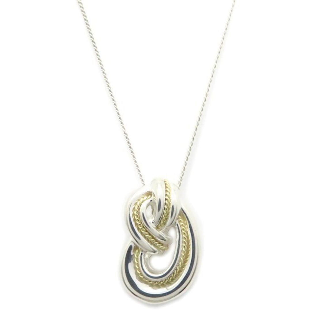 TIFFANY&Co. Tiffany Twist Knot Necklace SV925 x 18K Yellow Gold Women's 295650: --- Catalog ---Category: SizePendant Size: 18.3mm x 11.5mm / 0.72'' x 0.45''Neck Circumference: 46.5 cm / 18.3''Category: DesignGender: WomenMaterial: Silver 925, Yellow gold (18K)Necklace Type: Neckl
