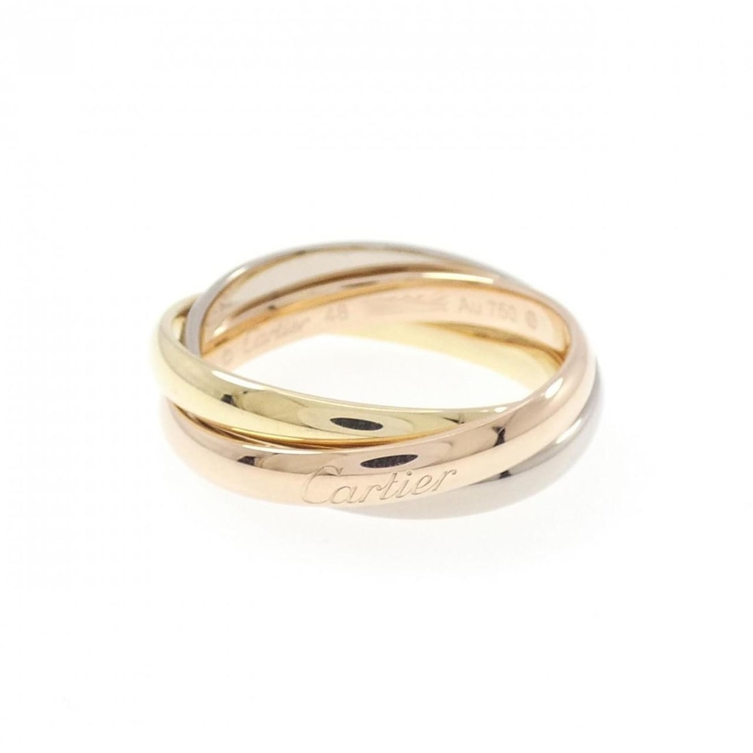 Cartier Trinity Ring: --- Catalog ---Category: SizeUS Size: 4.5Brand Size: 48Category: DesignType: Band ringGender: WomenMaterial: Pink gold (18K), White gold (18K), Yellow gold (18K)Category: GeneralBrand: Cartier---