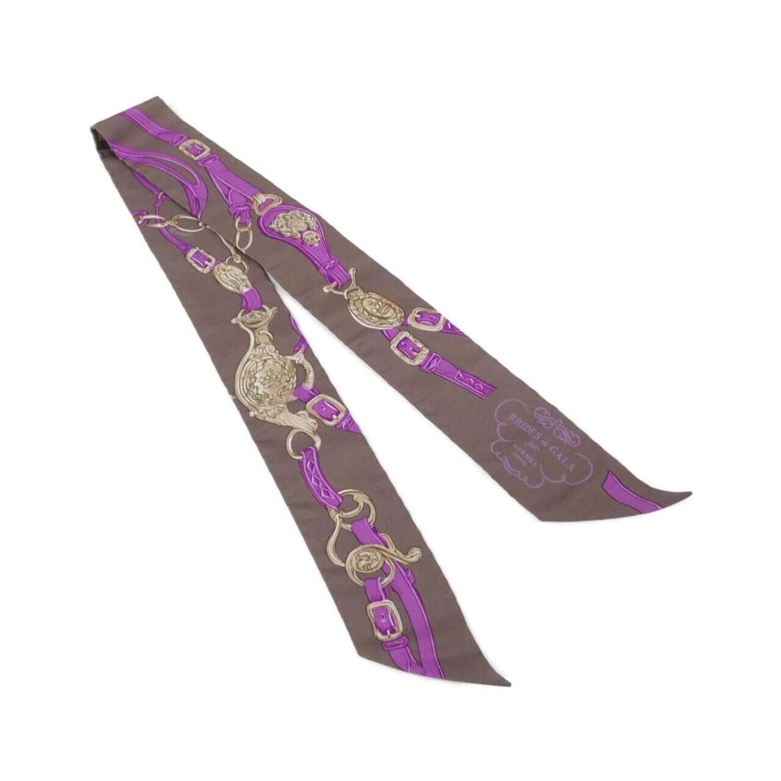 Hermes BRIDES DE GALA Twilly 061266S Scarf Muffler: --- Catalog ---Category: SizeSize (LxW): 5cm x 86cm / 1.96'' x 33.85''Category: DesignType: ScarfColor: Brown, PurpleGender: WomenMaterial: Silk Category: GeneralMPN: 061266SBrand: Hermes--- Item List