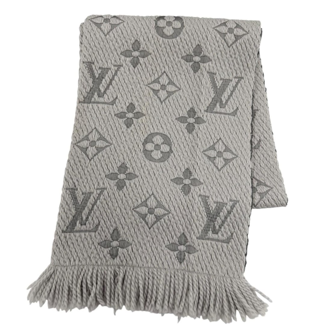 LOUIS VUITTON M74742 Echarpe Logomania Wool Silk Gris Perle Fringe Stole Scarf, Made in Italy,: --- Catalog ---Category: SizeSize (LxW): 1.56m x 31cm / 61.41'' x 12.2''Category: DesignType: StoleGender: WomenMaterial: Wool , Silk Category: GeneralMPN: M74742Brand: Louis VuittonCountry of Origin: