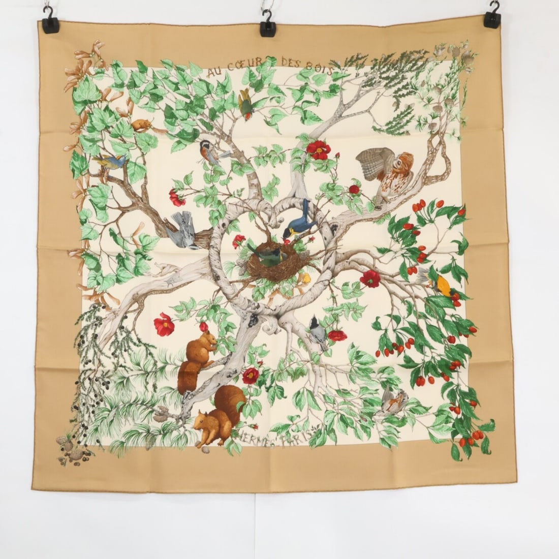 HERMES AU COEUR DES BOIS (In the Forest) Silk Scarf/Muffler, Brown, Women's: --- Catalog ---Category: SizeSize (LxW): 89cm x 90cm / 35.03'' x 35.43''Category: DesignType: ScarfColor: BrownGender: WomenMaterial: Silk Category: GeneralBrand: Hermes--- Item List ---Section: Condi