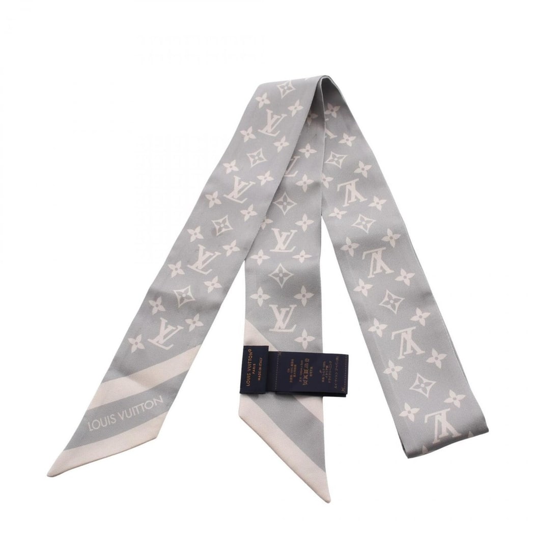 Louis Vuitton Bandeau BB Monogram Silhouette Gris Ribbon Scarf Muffler Silk Women's Gray M97398: --- Catalog ---Category: SizeSize (LxW): 1.18m x 5cm / 46.45'' x 1.96''Category: DesignType: ScarfColor: GrayGender: WomenMaterial: Silk Category: GeneralLine: MonogramBrand: Louis Vuitton--- Item Lis