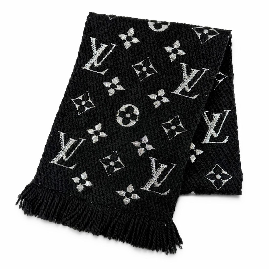 LOUIS VUITTON M75833 Echarpe Logomania Shine Wool Silk Stole Scarf, Black, Made in Italy, Authentic,: --- Catalog ---Category: SizeSize (LxW): 1.55m x 29cm / 61.02'' x 11.41''Category: DesignType: StoleColor: BlackGender: WomenMaterial: Wool , Silk , Polyester Category: GeneralMPN: M75833Brand: Louis 