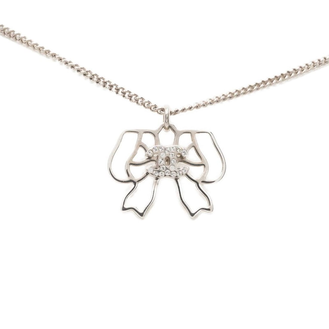 Chanel Coco Mark Ribbon Motif Necklace, Silver Metal Rhinestone, Women's CHANEL: --- Catalog ---Category: SizePendant Size: 17.8mm x 21.6mm / 0.7'' x 0.85''Neck Circumference: 59 cm / 23.22''Category: DesignColor: SilverGender: WomenMaterial: Metal, RhinestoneNecklace Type: Neckla