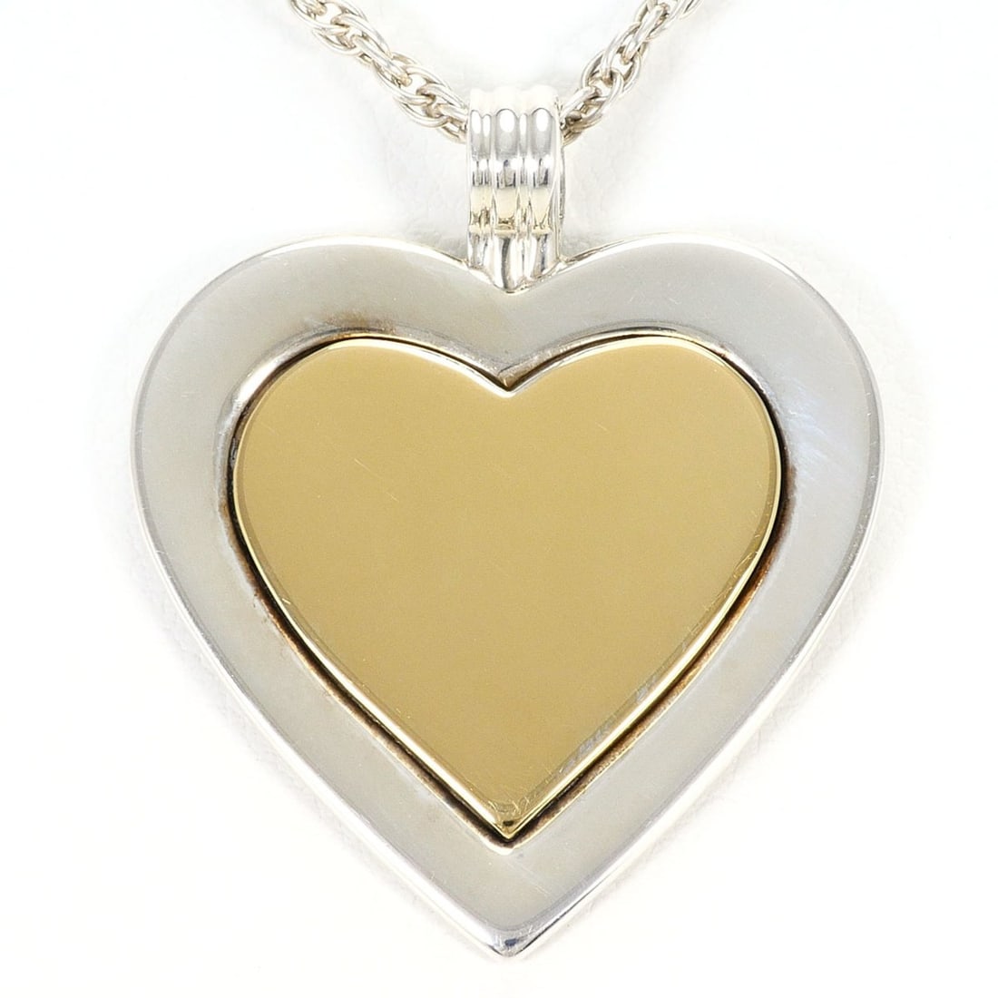 Tiffany & Co. Heart 18K Yellow Gold Silver Necklace, Total Weight 13.5g, 45cm, Jewelry: --- Catalog ---Category: SizeWeight: 13.5g / 0.47oz.Pendant Size: 31mm x 26mm / 1.22'' x 1.02''Neck Circumference: 45 cm / 17.71''Category: DesignGender: WomenMaterial: Silver 925, Yellow gold