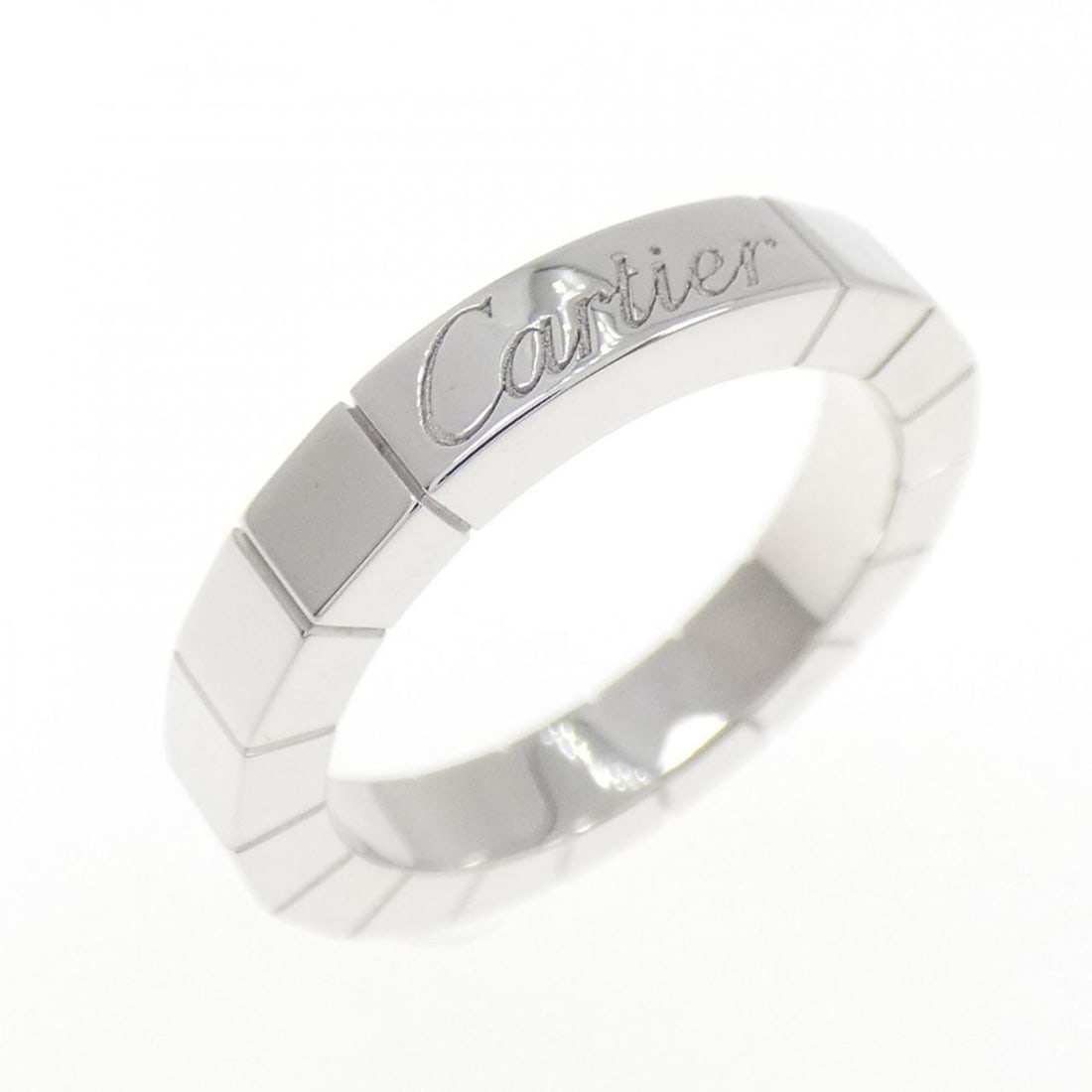 Cartier Lanieres Ring: --- Catalog ---Category: SizeUS Size: 3.5Brand Size: 45Category: DesignType: Band ringColor: White goldGender: WomenMaterial: White gold (18K)Category: GeneralMPN: B4045000Brand: Cartier--- Item List
