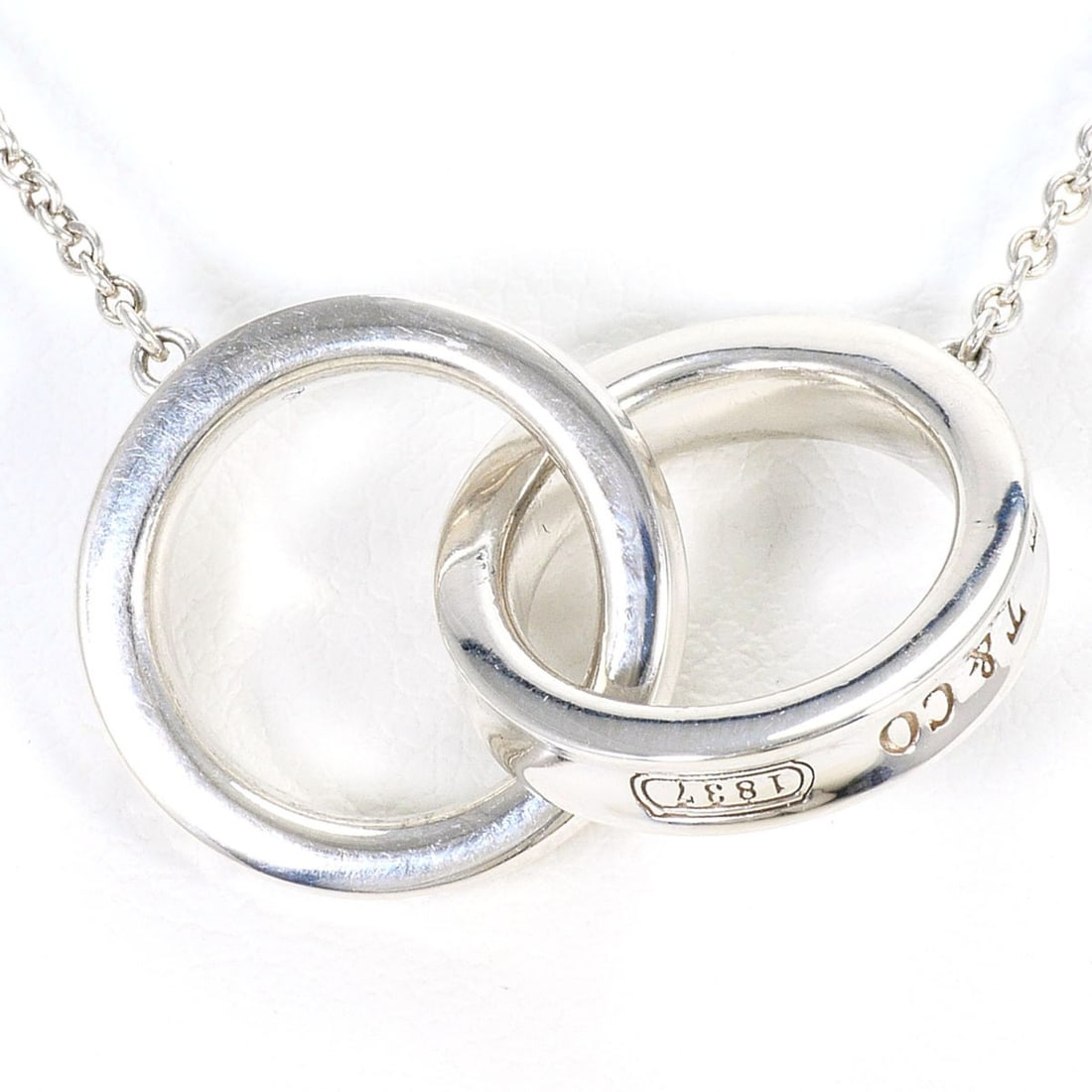 Tiffany & Co. 1837 Interlocking Circle Silver Necklace, Total Weight 5.7g, 40cm, Like New Condition.: --- Catalog ---Category: SizeWeight: 5.7g / 0.2oz.Pendant Size: 14mm x 20mm / 0.55'' x 0.78''Neck Circumference: 40 cm / 15.74''Category: DesignGender: WomenMaterial: Silver 925Necklace Type: Necklace