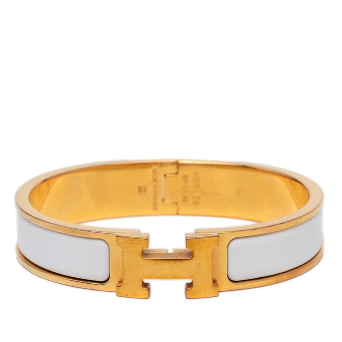 Hermes Click H PM Bracelet, Gold and White Plated Enamel, Women's.: --- Catalog ---Category: SizeWidth: 1.2cm / 0.47''Length: 18.5cm / 7.28''Category: DesignType: Charm braceletColor: Gold, WhiteGender: WomenMaterial: EnamelCategory: GeneralBrand: Hermes--- Item List 