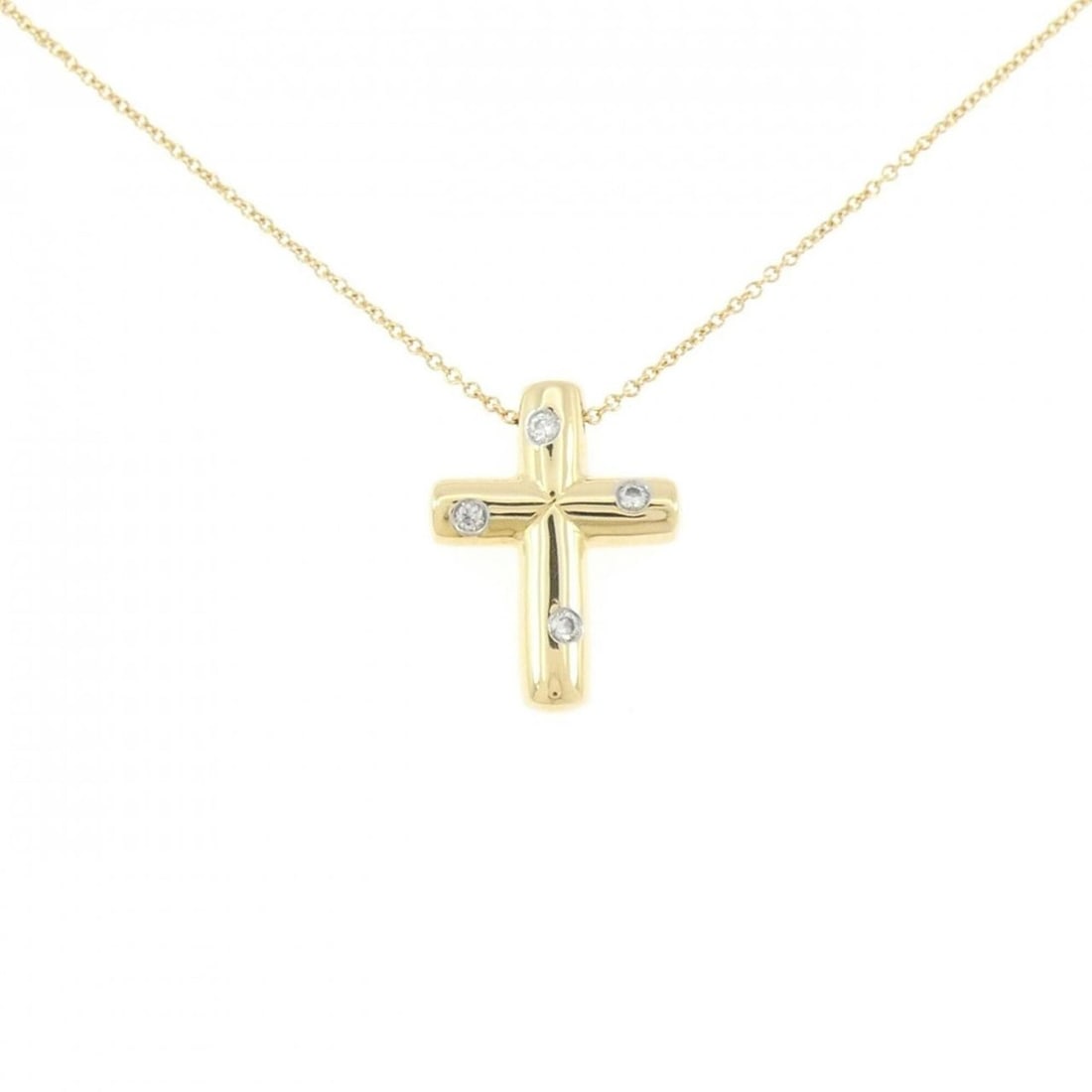 Tiffany & Co. Dots Cross Necklace: --- Catalog ---Category: SizePendant Size: 20.6mm x 15.6mm / 0.81'' x 0.61''Neck Circumference: 41 cm / 16.14''Category: DesignGender: WomenMaterial: Yellow gold (18K)Pendant Type: PendantNecklace