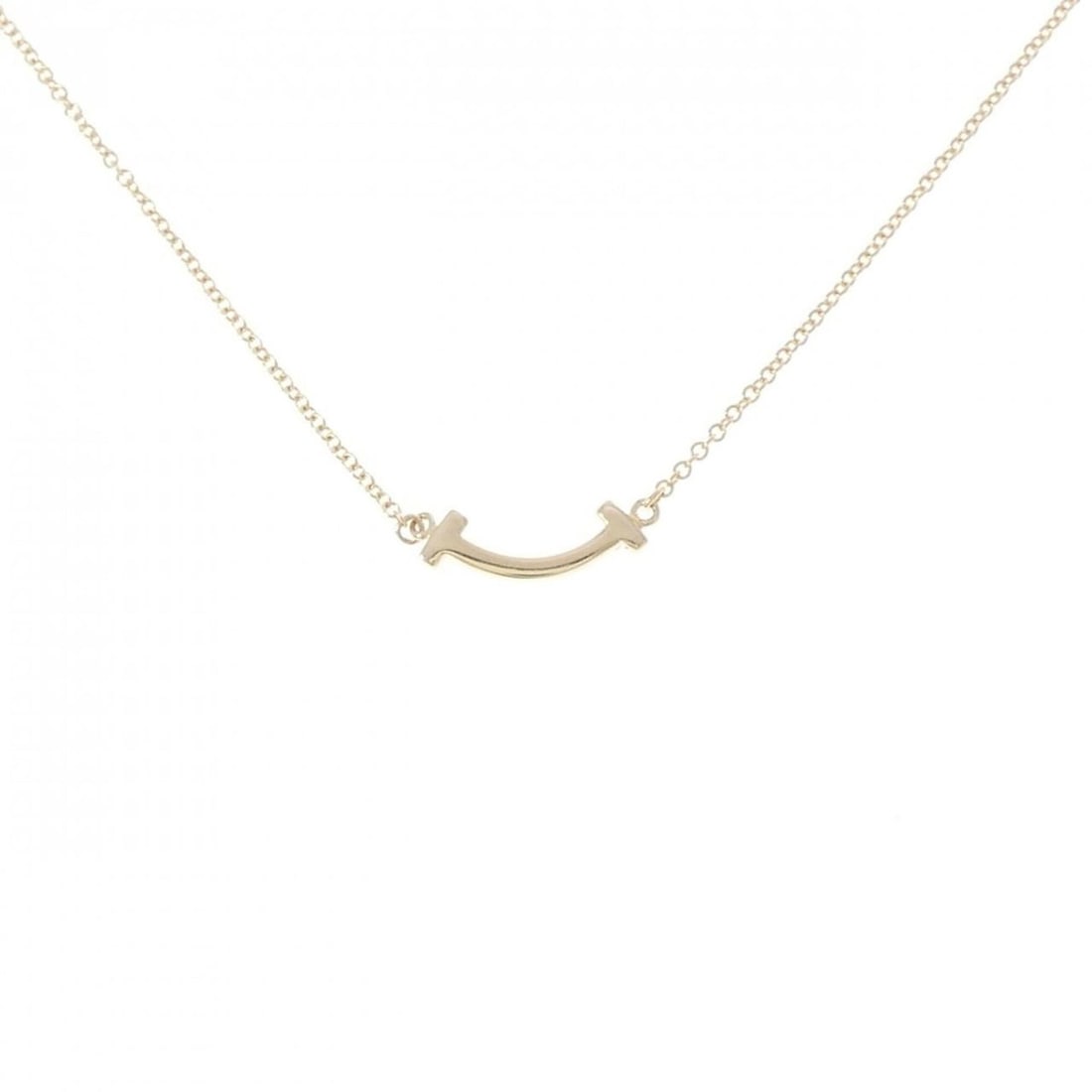 Tiffany T Smile Mini Necklace: --- Catalog ---Category: SizePendant Size: 4.4mm x 13.2mm / 0.17'' x 0.51''Neck Circumference: 40 cm - 46 cm / 15.74'' - 18.11''Category: DesignGender: WomenMaterial: Yellow gold (18K)Pendant Type: