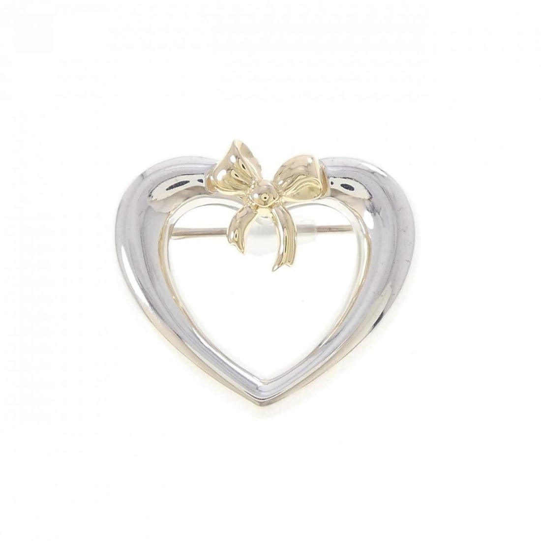 Tiffany & Co. 925 750YG Brooch: --- Catalog ---Category: SizeSize (HxWxD): 2.38cm x 2.7cm / 0.93'' x 1.06''Category: DesignType: BroochGender: WomenMaterial: Silver 925, Yellow gold (18K)Category: GeneralBrand: Tiffany--- Item List 