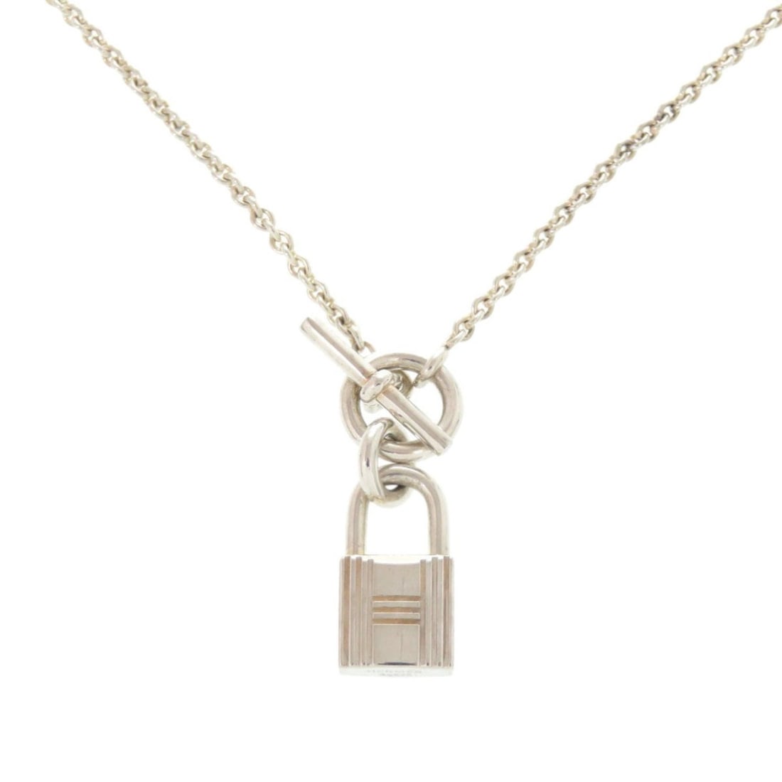 Hermes Amulette Cadena Necklace, Sterling Silver 925, 0669HERMES: --- Catalog ---Category: SizePendant Size: 18mm / 0.7''Neck Circumference: 38 cm / 14.96''Category: DesignColor: SilverGender: WomenMaterial: Silver 925Necklace Type: NecklaceCategory: GeneralBrand: H