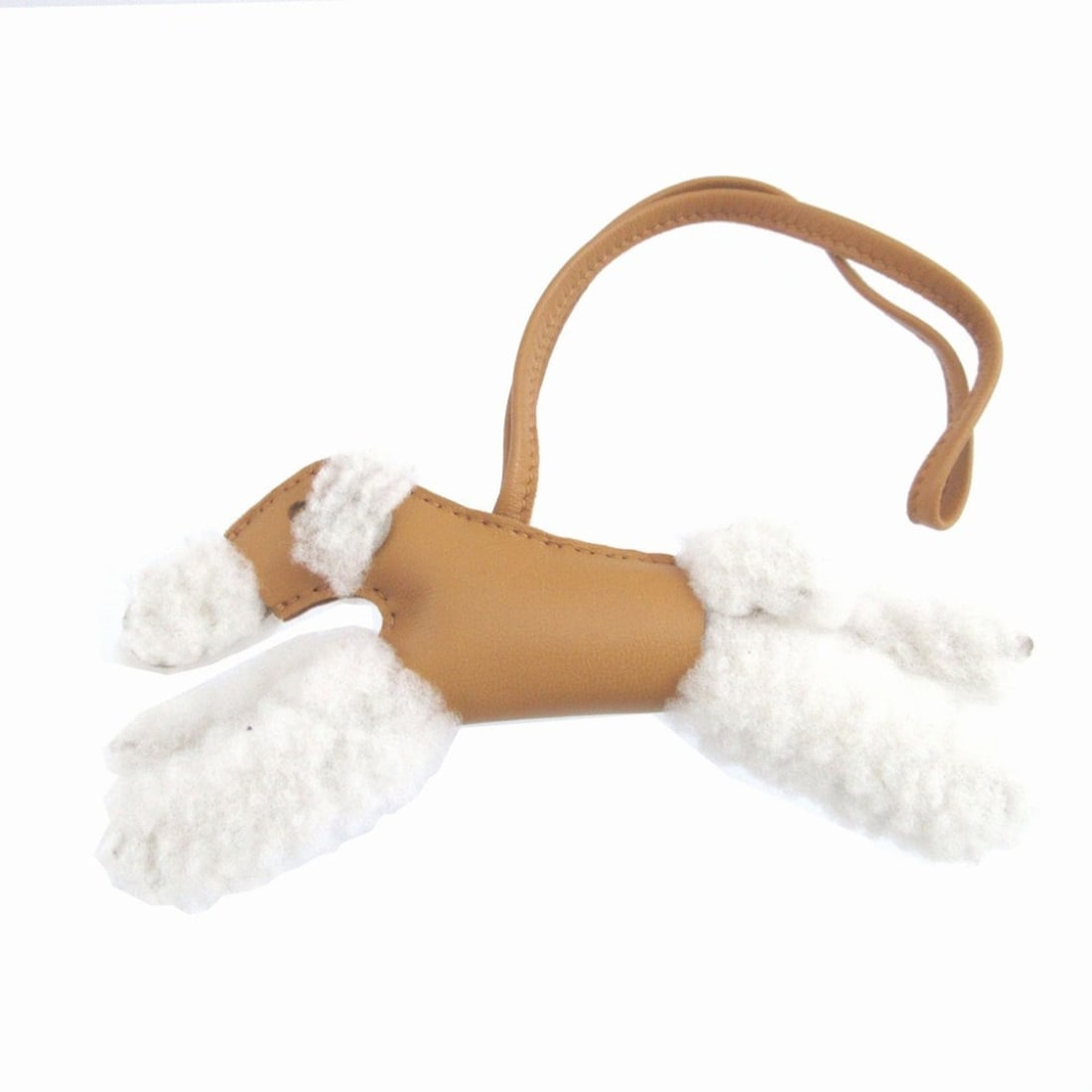 Hermes Buddy U stamp (2022 production) Agneau Milo Mouton Sesame Accessory Bag Charm Keychain: --- Catalog ---Category: SizeSize (HxWxD): 7cm x 14.5cm / 2.75'' x 5.7''Category: DesignType: KeyringColor: BrownGender: Women,MenMaterial: Agneau Milo, LeatherLeather/Fur Type: MoutonCategory: Genera
