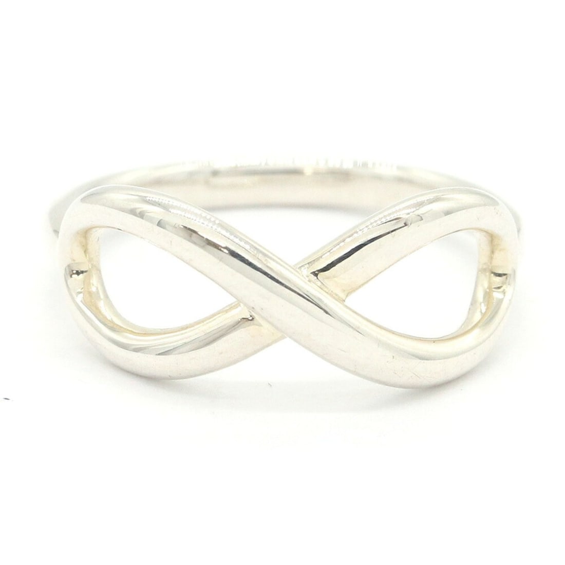 Tiffany & Co. Infinity Ring, Sterling Silver 925, US 5.5-6, Women's Ring.: --- Catalog ---Category: SizeJP Size: 10.5US Size: 5.5Category: DesignColor: SilverGender: WomenMaterial: Sterling silver 925Category: GeneralBrand: Tiffany--- Item List ---Section: ConditionRanking: