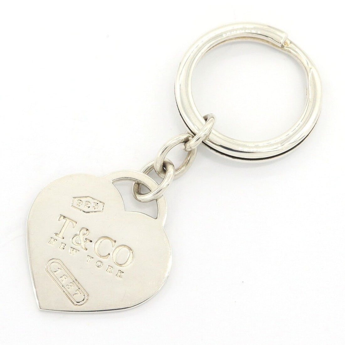 Tiffany & Co. 1837 Heart Keyring, Sterling Silver 925, Key Holder, Accessory, Bag Charm, Women's.: --- Catalog ---Category: SizeCharm Size: 2.85cm x 3.2cm / 1.12'' x 1.26''Category: DesignType: KeyringColor: SilverGender: WomenMaterial: Sterling silver 925Category: GeneralBrand: Tiffany--- Item Lis