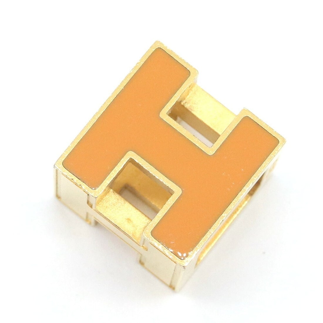 Hermes Cage d'H H-Cube Pendant Top, Orange Gold Metal Head Necklace for Women: --- Catalog ---Category: SizePendant Size: 12mm x 12mm / 0.47'' x 0.47''Category: DesignColor: Gold, OrangeGender: WomenMaterial: MetalPendant Type: PendantNecklace Type: NecklaceCategory: GeneralBran