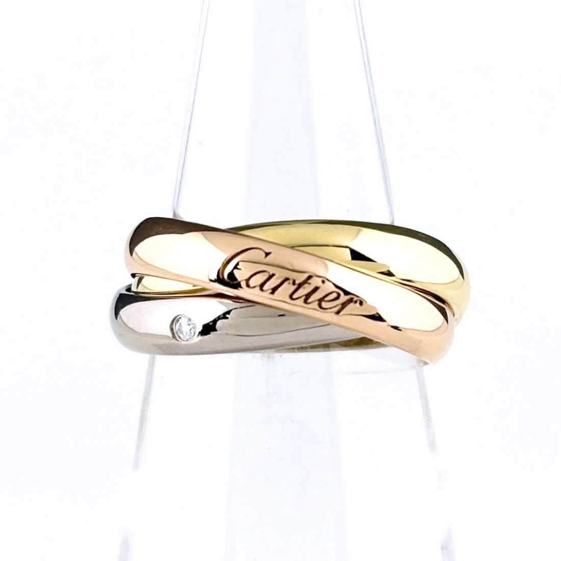Cartier Trinity 5P Diamond Ring, available in Yellow Gold (YG), Pink (PG), and White (WG). Features: --- Catalog ---Category: SizeJP Size: 10US Size: 5.5Category: DesignType: Band ringColor: Pink gold, White gold, Yellow goldGender: WomenMaterial: Pink gold (18K), White gold (18K), Yellow gold (18K)C