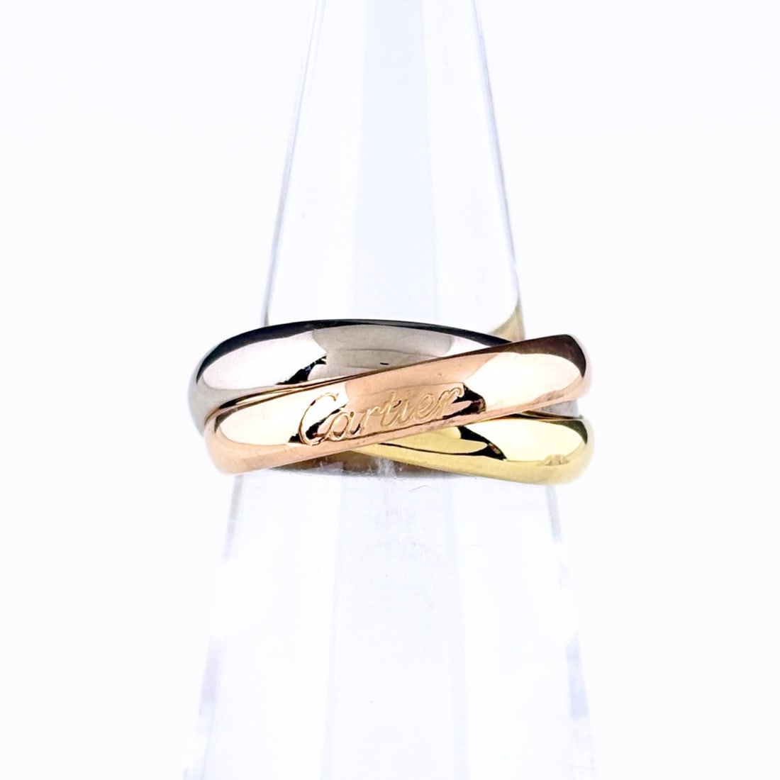 Cartier Trinity Ring, available in yellow gold (YG), pink (PG), and white (WG). 750 alloy. Suitable: --- Catalog ---Category: SizeJP Size: 11.5US Size: 6Category: DesignType: Band ringColor: Pink gold, White gold, Yellow goldGender: WomenMaterial: Pink gold (18K), White gold (18K), Yellow gold (18K)C