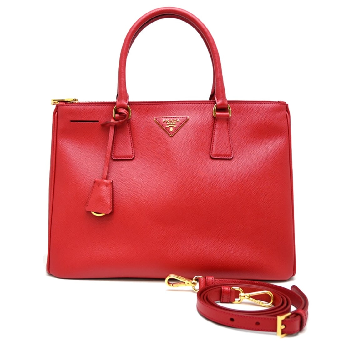 Prada Galleria Women's Handbag BN2274 Saffiano Leather FUOCO (Red): --- Catalog ---Category: SizeSize (HxWxD): 24cm x 35cm x 16cm / 9.44'' x 13.77'' x 6.29''Category: DesignType: HandbagColor: Fuoco, Red colorGender: WomenMaterial: Leather Leather/Fur Type: Saffiano l