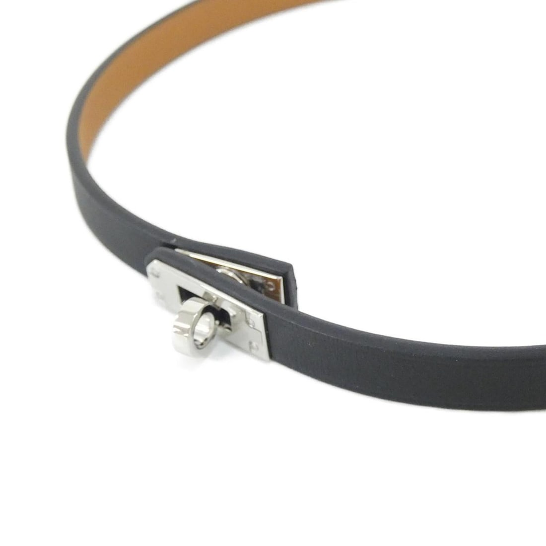 Hermes Mini Kelly 500310FK Choker: --- Catalog ---Category: SizeNeck Circumference: 40 cm / 15.74''Category: DesignColor: Black, SilverGender: WomenMaterial: Swift leatherNecklace Type: ChokerCategory: GeneralMPN: 500310FKBrand: