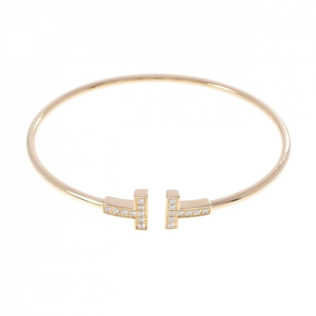 Tiffany T Wire Bangle: --- Catalog ---Category: SizeLength: 17.5cm / 6.88''Category: DesignType: BangleGender: WomenMaterial: Pink gold (18K)Category: GeneralBrand: Tiffany--- Item List ---Section: ConditionRanking: Rank SA