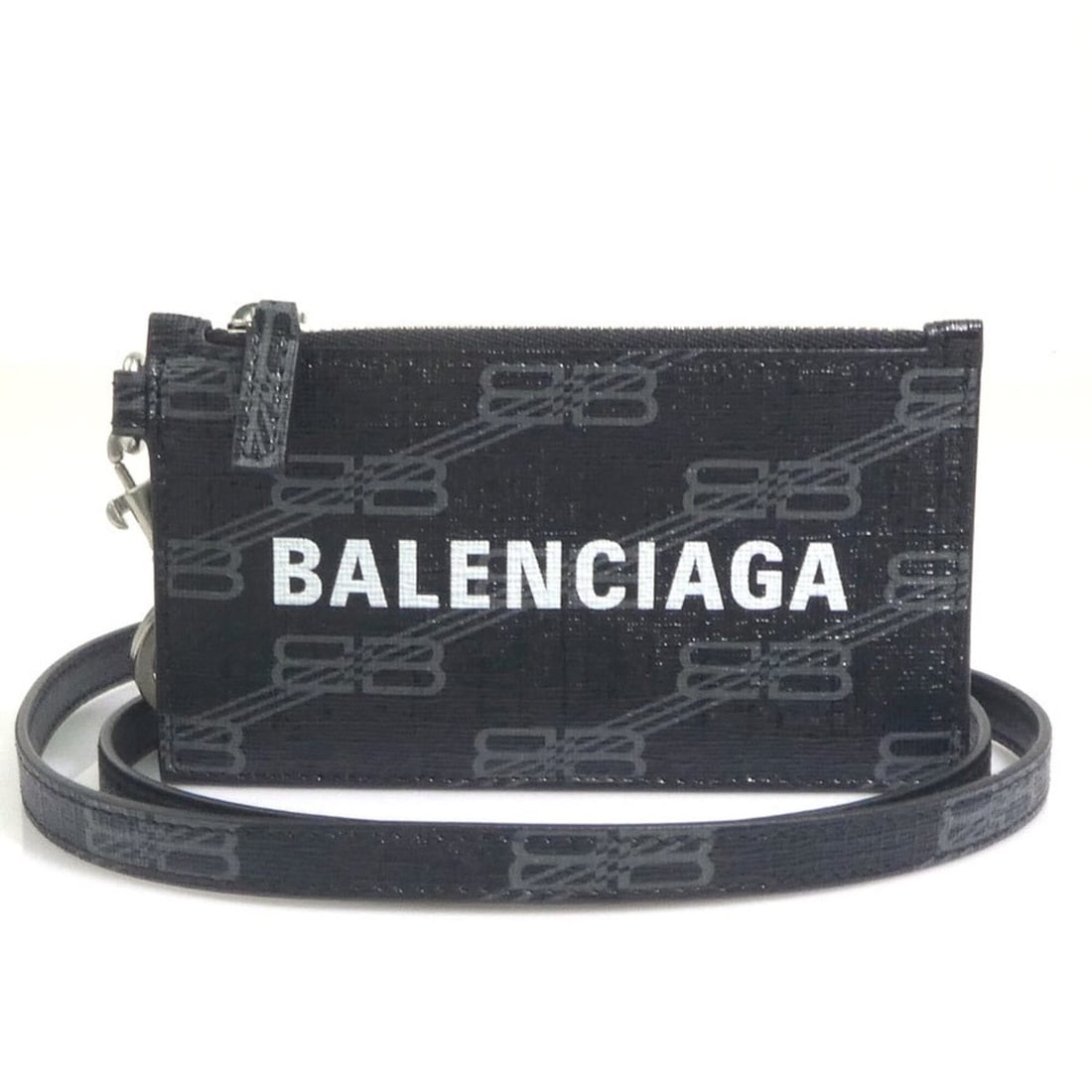 Balenciaga wallet/coin purse, leather, black, men's/women's, 594548 h32323i: --- Catalog ---Category: SizeSize (HxWxD): 7cm x 12.5cm / 2.75'' x 4.92''Category: DesignType: Coin purse/coin caseColor: BlackGender: Men,WomenMaterial: Leather Category: GeneralMPN: 594548Brand: