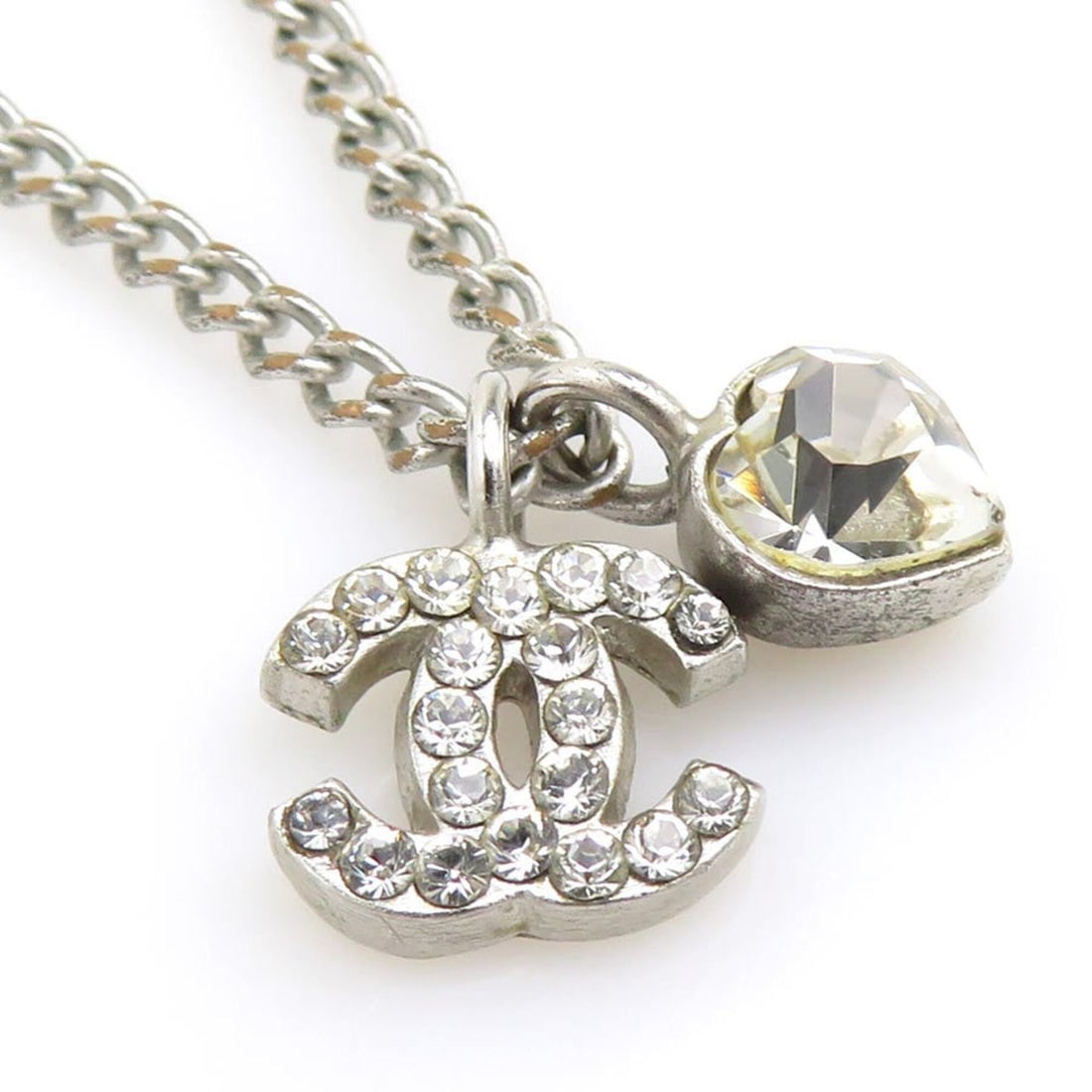 Chanel necklace, Coco Mark heart, metal, rhinestone, silver, women's, e62037a: --- Catalog ---Category: SizePendant Size: 8mm x 9mm / 0.31'' x 0.35''Neck Circumference: 42 cm / 16.53''Category: DesignColor: SilverGender: WomenMaterial: Metal, RhinestoneNecklace Type: NecklaceCat