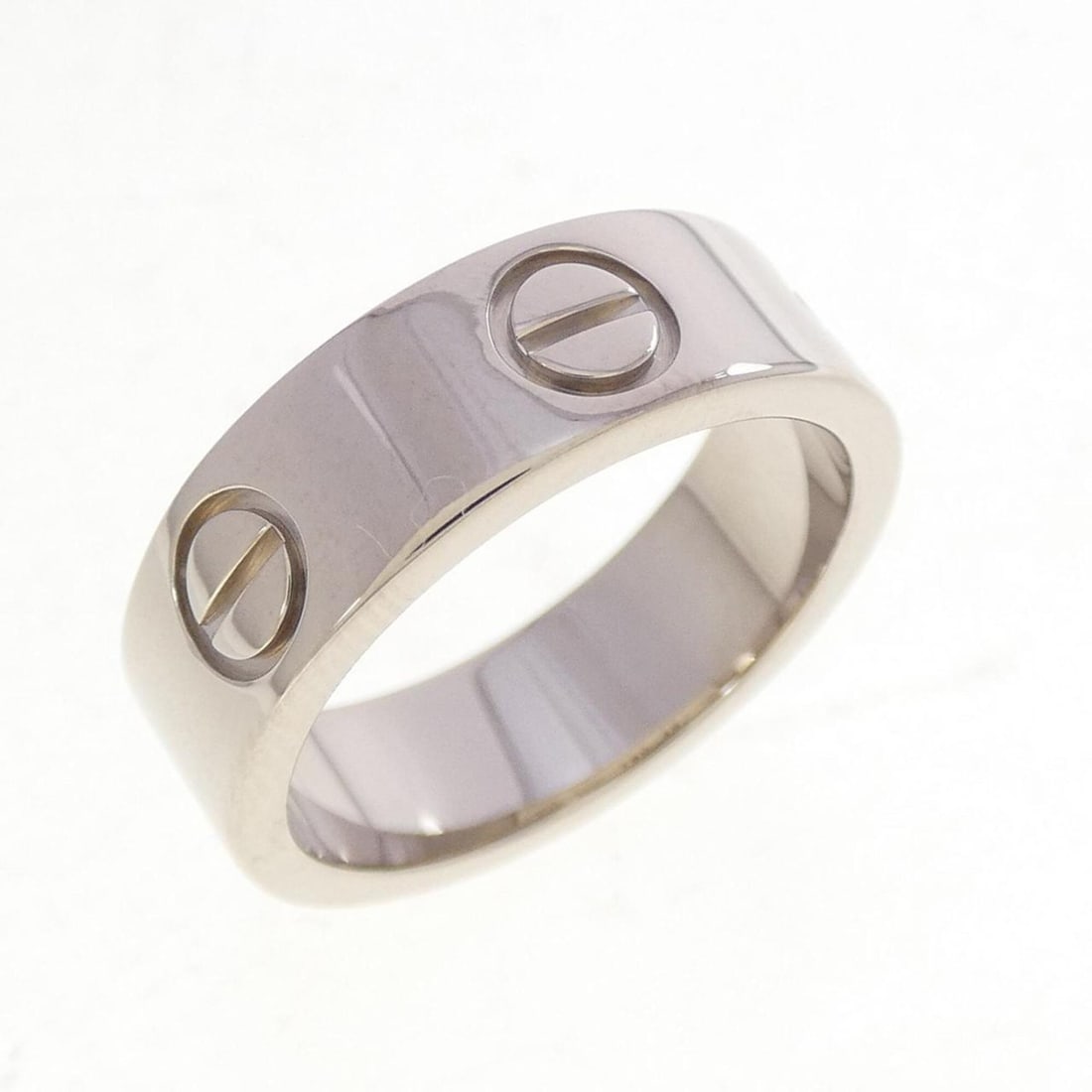 Cartier Love Ring: --- Catalog ---Category: SizeUS Size: 4.5Brand Size: 48Category: DesignType: Band ringGender: WomenMaterial: White gold (18K)Category: GeneralMPN: B4084700Brand: Cartier--- Item List ---Section: