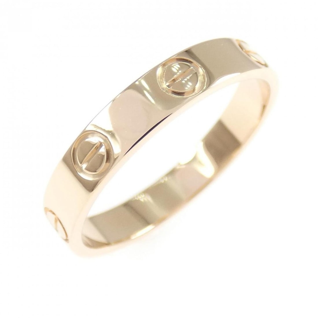 Cartier Mini Love Ring: --- Catalog ---Category: SizeUS Size: 7Brand Size: 54Category: DesignType: Band ringGender: WomenMaterial: Pink gold (18K)Category: GeneralBrand: Cartier--- Item List ---Section: ConditionRanking: Ran