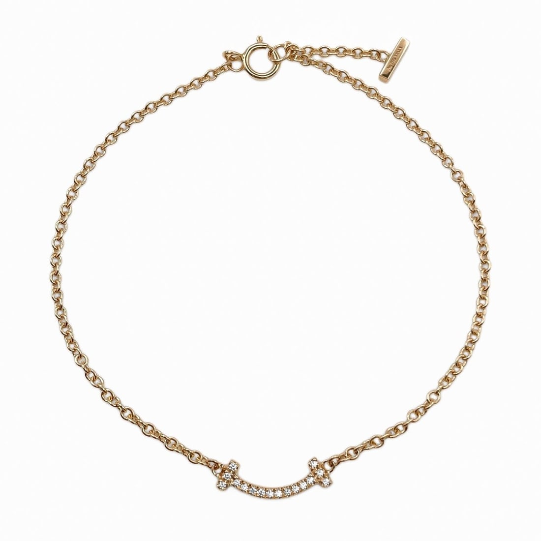 TIFFANY&Co. Tiffany T Smile Mini Diamond Bracelet Bangle K18PG Gold Women's: --- Catalog ---Category: SizeLength: 17cm / 6.69''Category: DesignType: Charm braceletGender: WomenMaterial: Pink gold (18K)Category: GeneralBrand: Tiffany--- Item List ---Section: ConditionRanking: R