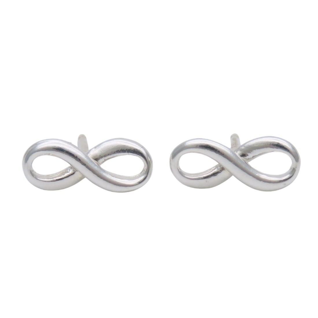 Tiffany & Co. Infinity Earrings, Sterling Silver 925, Women's.: --- Catalog ---Category: SizeSize (HxWxD): 11.00mm x 4.00mm / 0.43'' x 0.16''Category: DesignType: Stud earringsColor: SilverGender: WomenMaterial: Silver 925Category: GeneralBrand: Tiffany--- Item Li
