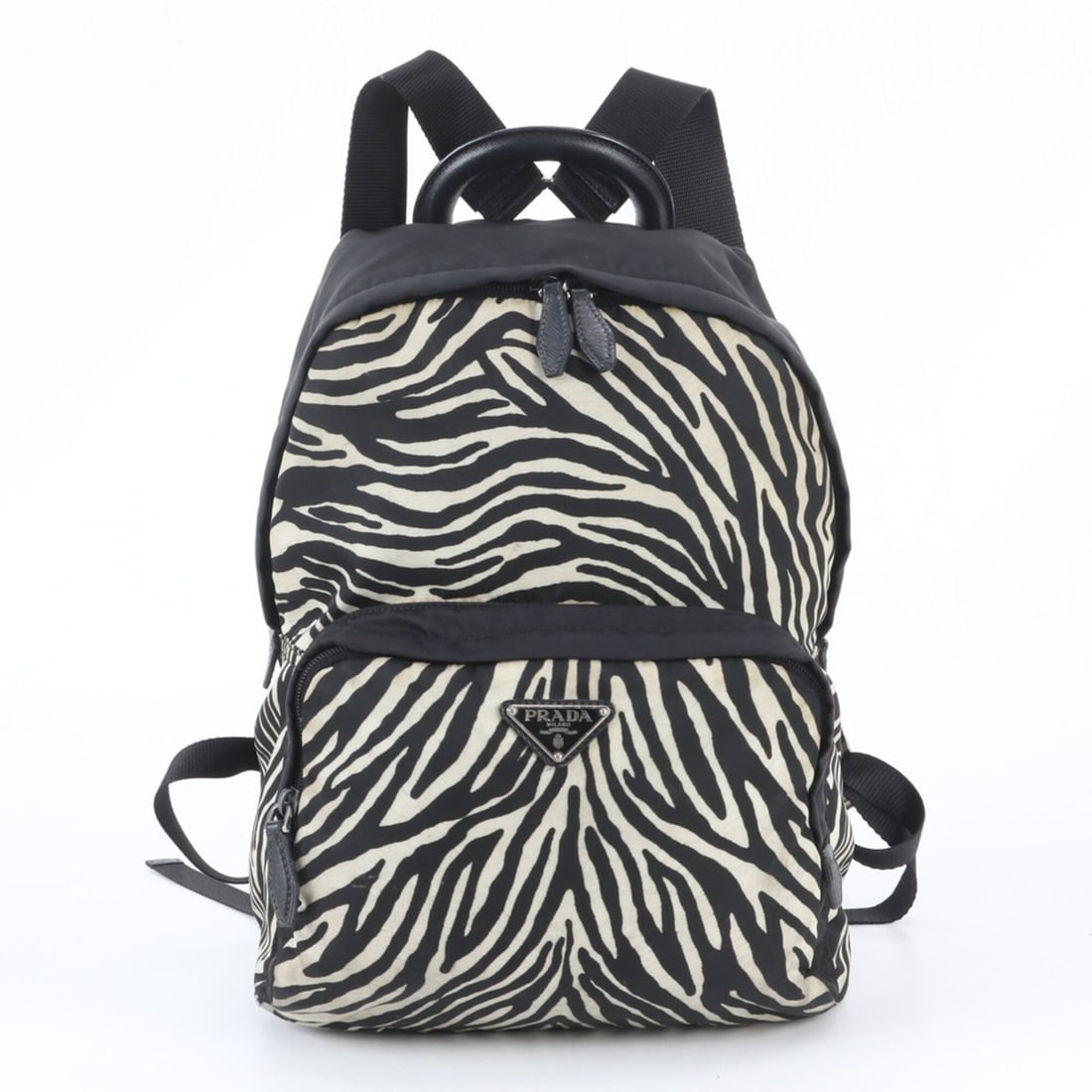 Prada Zebra Triangle Logo Leather Backpack, Rucksack, Shoulder Bag, Handbag for Women: --- Catalog ---Category: SizeSize (HxWxD): 33cm x 26cm x 15cm / 12.99'' x 10.23'' x 5.9''Category: DesignType: Backpack, HandbagColor: Black, WhiteGender: WomenMaterial: Leather , Nylon Category: Gene