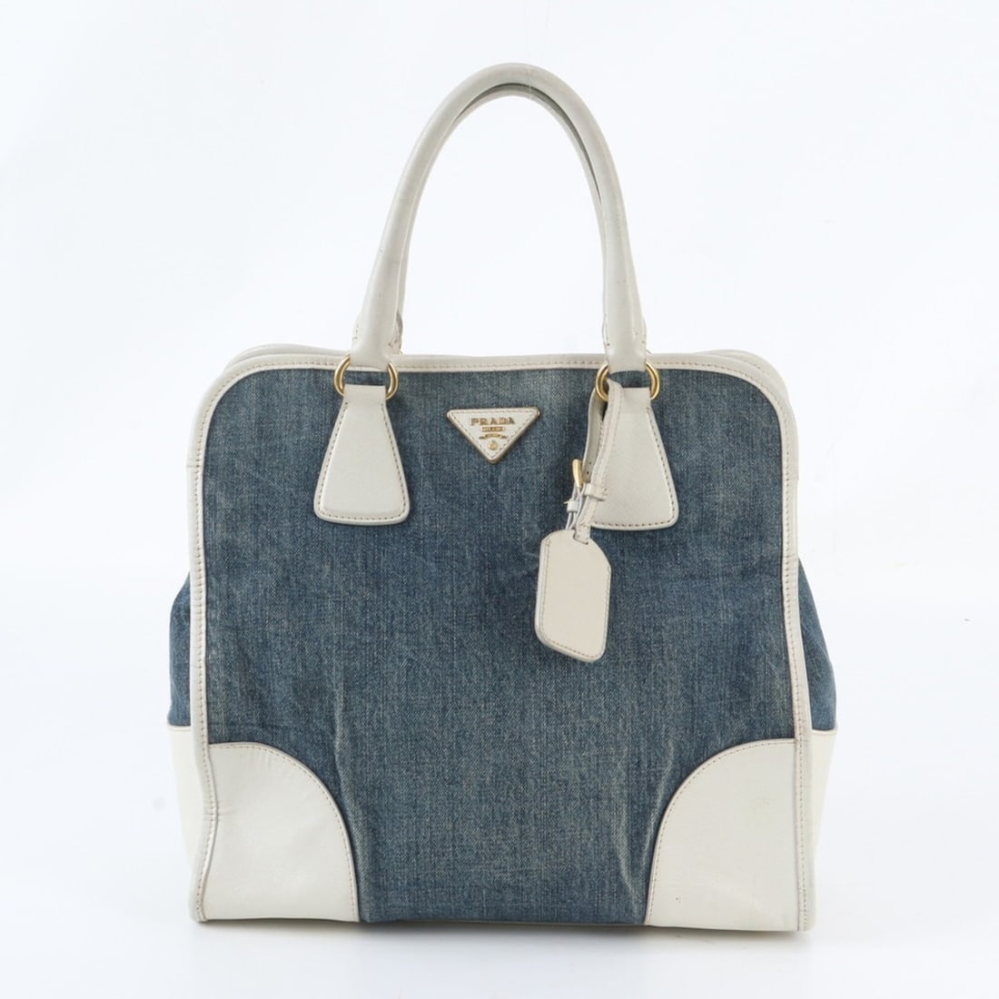 Prada Saffiano Leather Denim Triangle Logo Tote Bag Handbag Shoulder for Women: --- Catalog ---Category: SizeSize (HxWxD): 32cm x 32cm x 17cm / 12.59'' x 12.59'' x 6.69''Category: DesignType: Handbag, Tote bagColor: Navy, WhiteGender: WomenMaterial: Leather Category: GeneralBrand