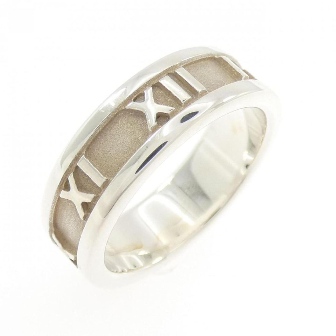 Tiffany Atlas Ring: --- Catalog ---Category: SizeJP Size: 13.5US Size: 6.5Category: DesignType: Band ringGender: WomenMaterial: Silver 925Category: GeneralBrand: Tiffany--- Item List ---Section: ConditionRanking: Rank