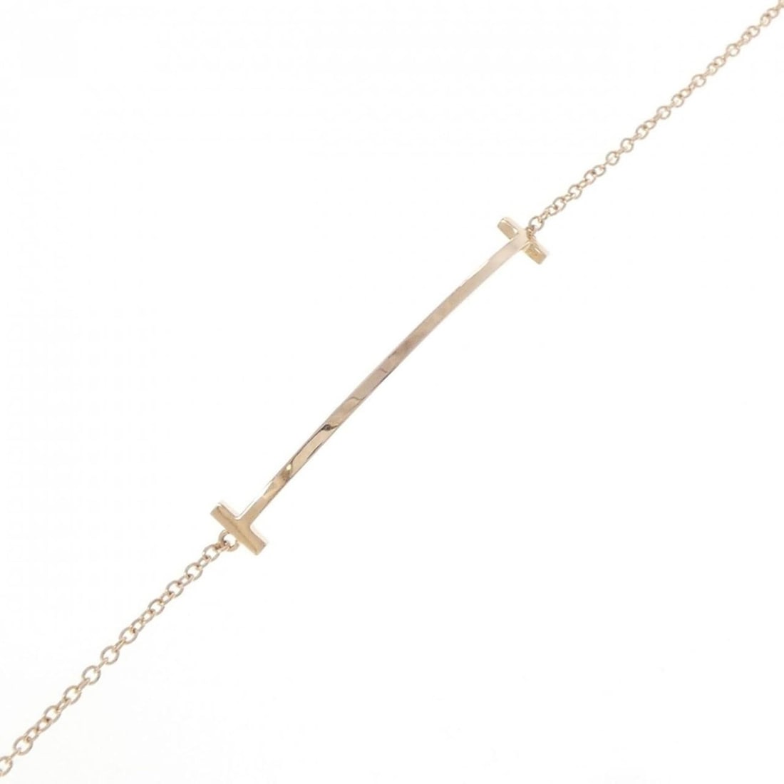 Tiffany T Smile Bracelet: --- Catalog ---Category: SizeLength: 16.5cm / 6.49''Category: DesignType: Charm braceletGender: WomenMaterial: Pink gold (18K)Category: GeneralBrand: Tiffany--- Item List ---Section: