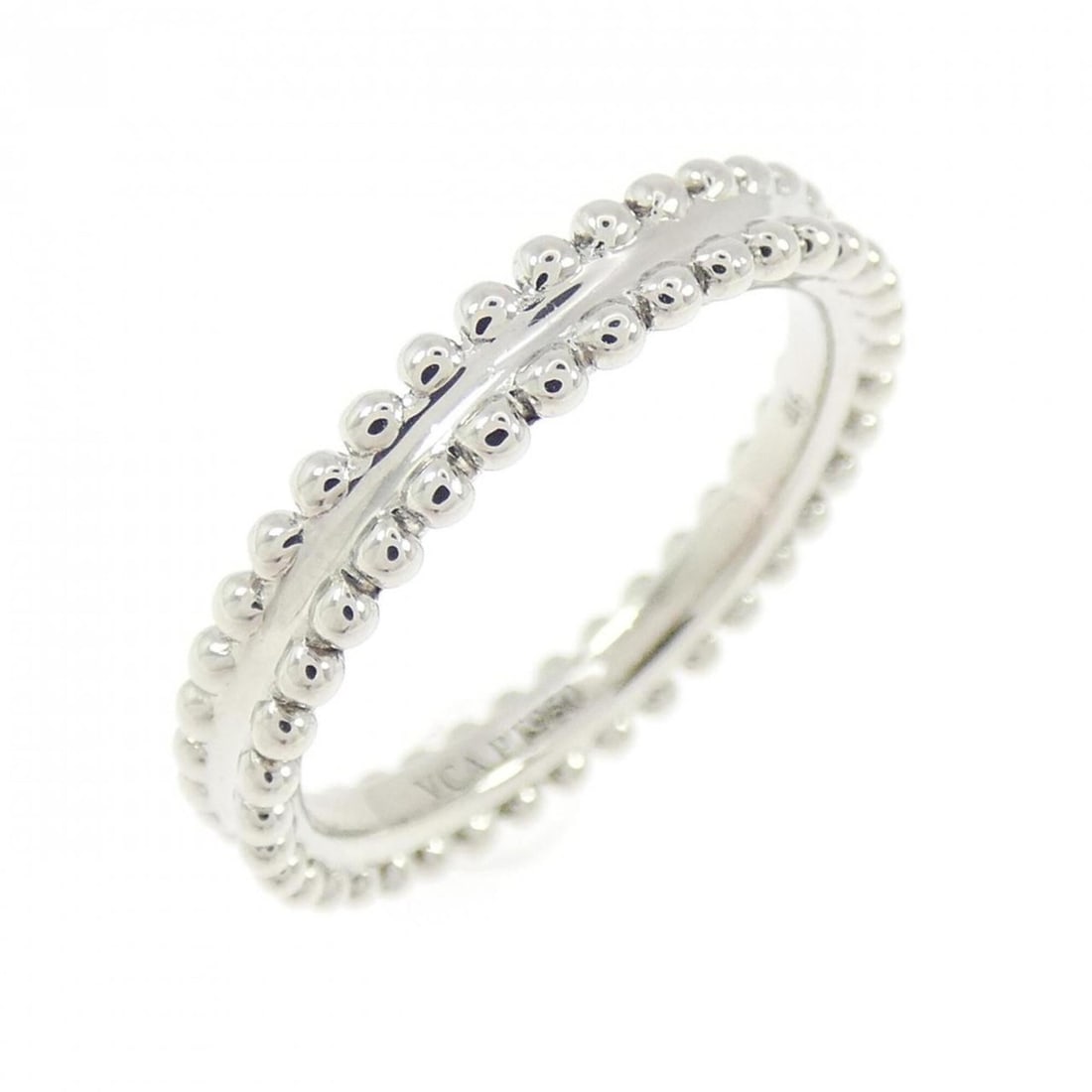 Van Cleef & Arpels Ester Ring: --- Catalog ---Category: SizeUS Size: 3.5Brand Size: 46Category: DesignType: Band ringGender: WomenMaterial: Platinum 950Category: GeneralMPN: VCARN59B00Brand: Van Cleef & Arpels--- Item List