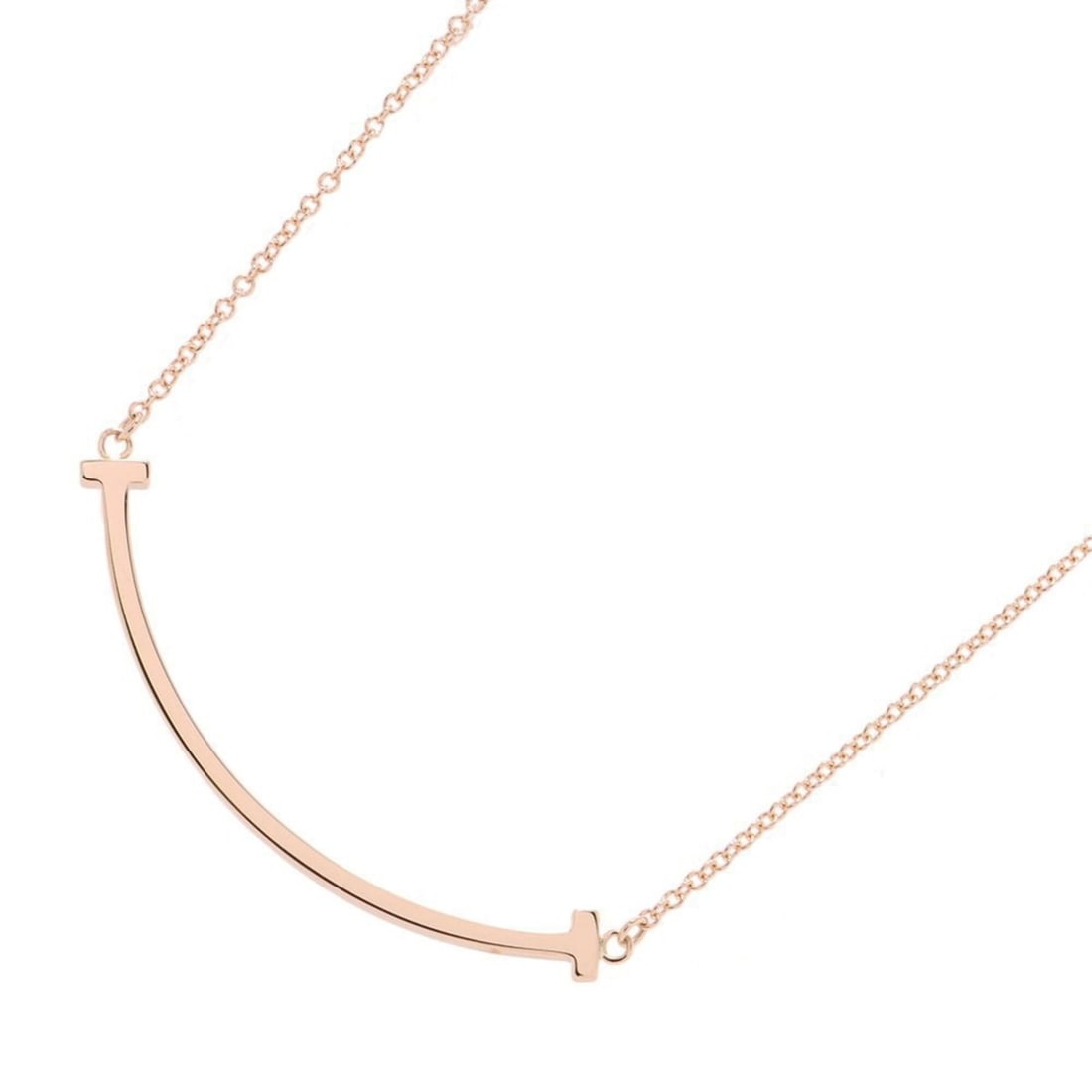 Tiffany & Co. T Smile Pendant Necklace, Small, 18K Pink Gold, 60011678.: --- Catalog ---Category: SizeWeight: 2.7g / 0.09oz.Pendant Size: 3.6mm x 37.5mm / 0.14'' x 1.47''Neck Circumference: 40 cm - 45.5 cm / 15.74'' - 17.91''Category: DesignGender: WomenMaterial: Pink gold