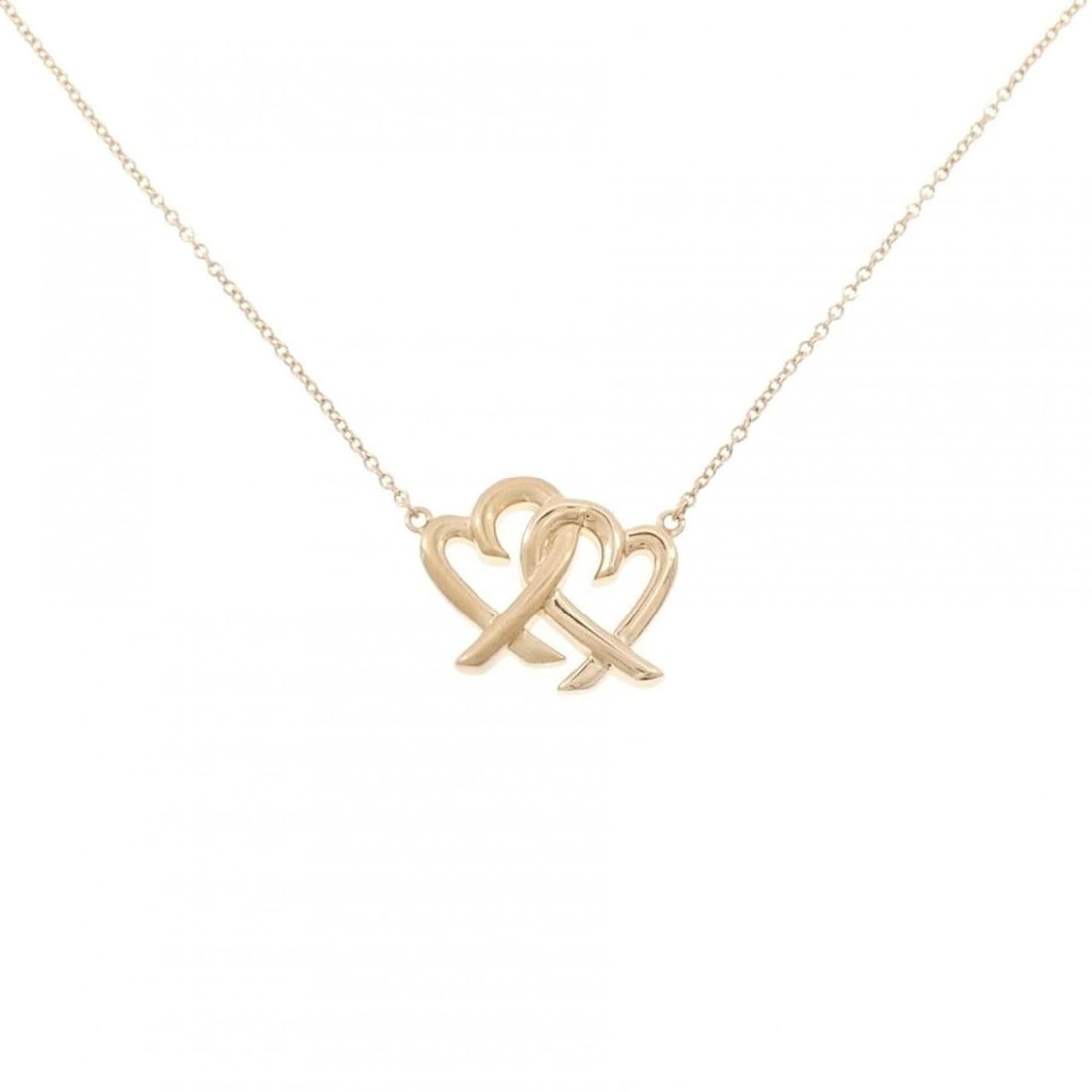 Tiffany Loving Heart Interlocking Necklace: --- Catalog ---Category: SizePendant Size: 14mm x 17mm / 0.55'' x 0.66''Neck Circumference: 46 cm / 18.11''Category: DesignGender: WomenMaterial: Pink gold (18K)Pendant Type: PendantNecklace Type: Nec