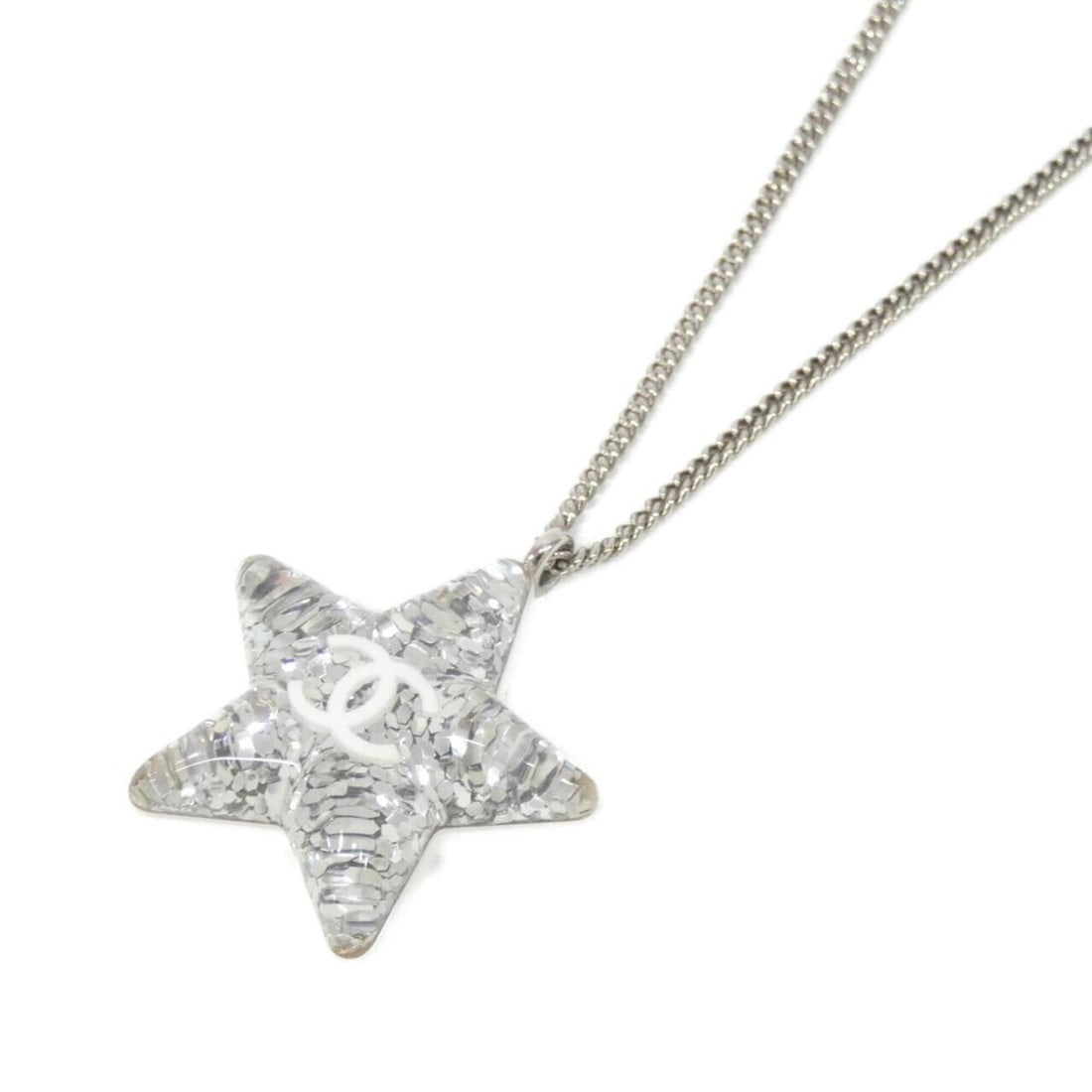 Chanel ABF131 Necklace: --- Catalog ---Category: SizePendant Size: 34mm x 31mm / 1.33'' x 1.22''Neck Circumference: 43 cm - 61 cm / 16.92'' - 24.01''Category: DesignColor: Clear, Silver, WhiteStone: Artificial pearlGender: W