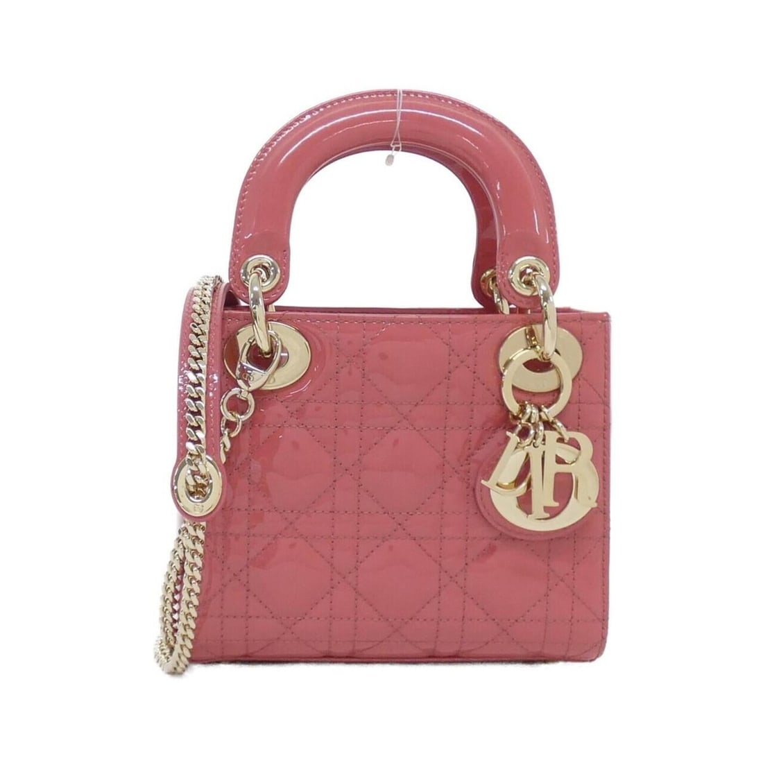 Christian Dior Lady Mini M0505OWCB Handbag: --- Catalog ---Category: SizeSize (HxWxD): 14cm x 17cm x 7cm / 5.51'' x 6.69'' x 2.75''Category: DesignType: HandbagColor: Dusty pinkGender: WomenMaterial: Leather Leather/Fur Type: Enamel LeatherCate