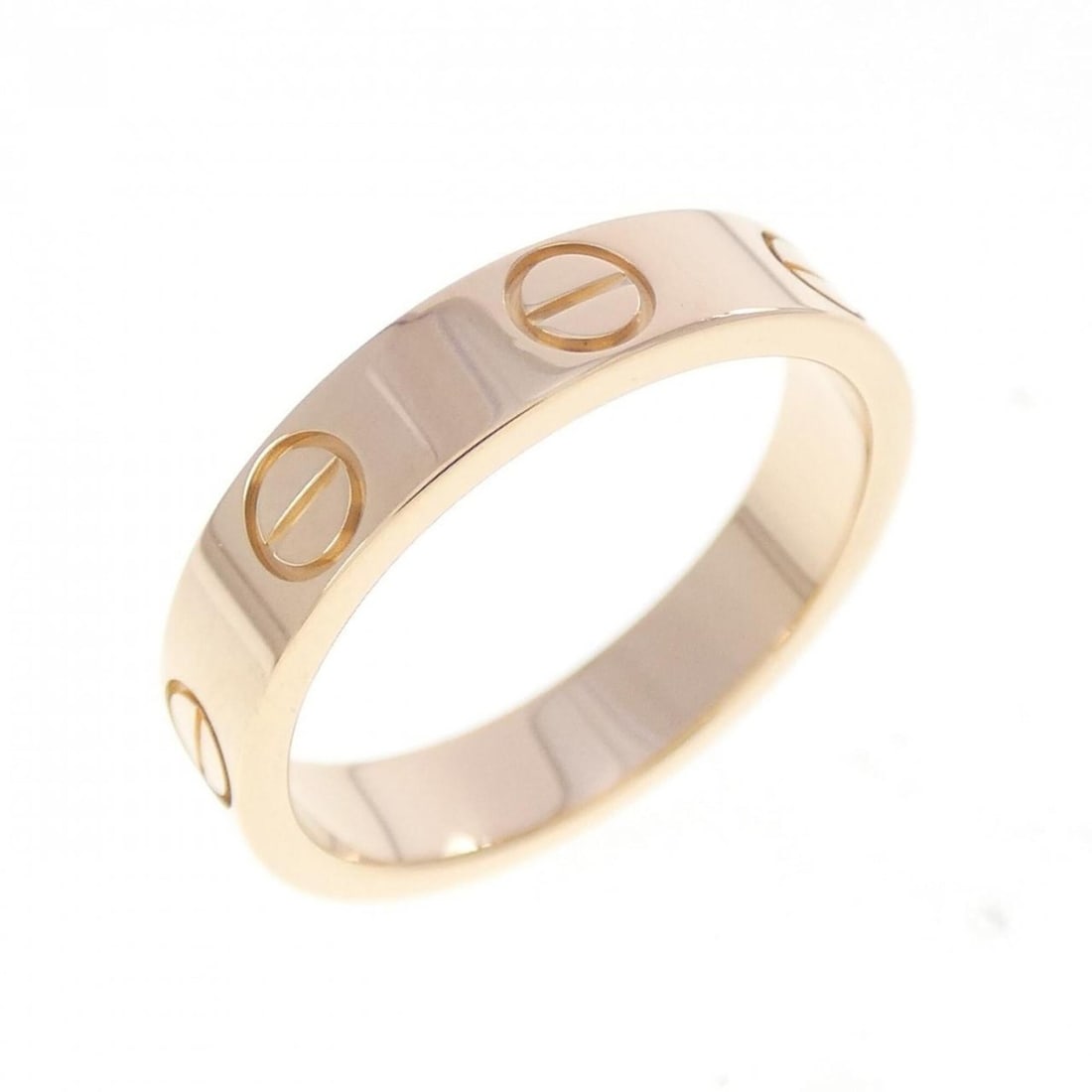 Cartier Mini Love Ring: --- Catalog ---Category: SizeUS Size: 3.5Brand Size: 46Category: DesignType: Band ringGender: WomenMaterial: Pink gold (18K)Category: GeneralMPN: B4085200Brand: Cartier--- Item List ---Section: Condit