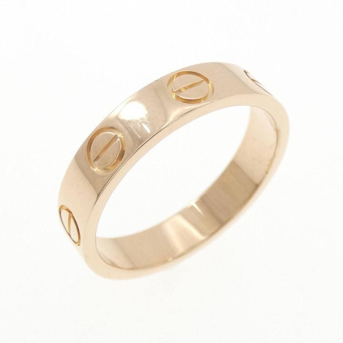 Cartier Mini Love Ring: --- Catalog ---Category: SizeUS Size: 4Brand Size: 47Category: DesignType: Band ringGender: WomenMaterial: Pink gold (18K)Category: GeneralBrand: Cartier--- Item List ---Section: ConditionRanking: Ran