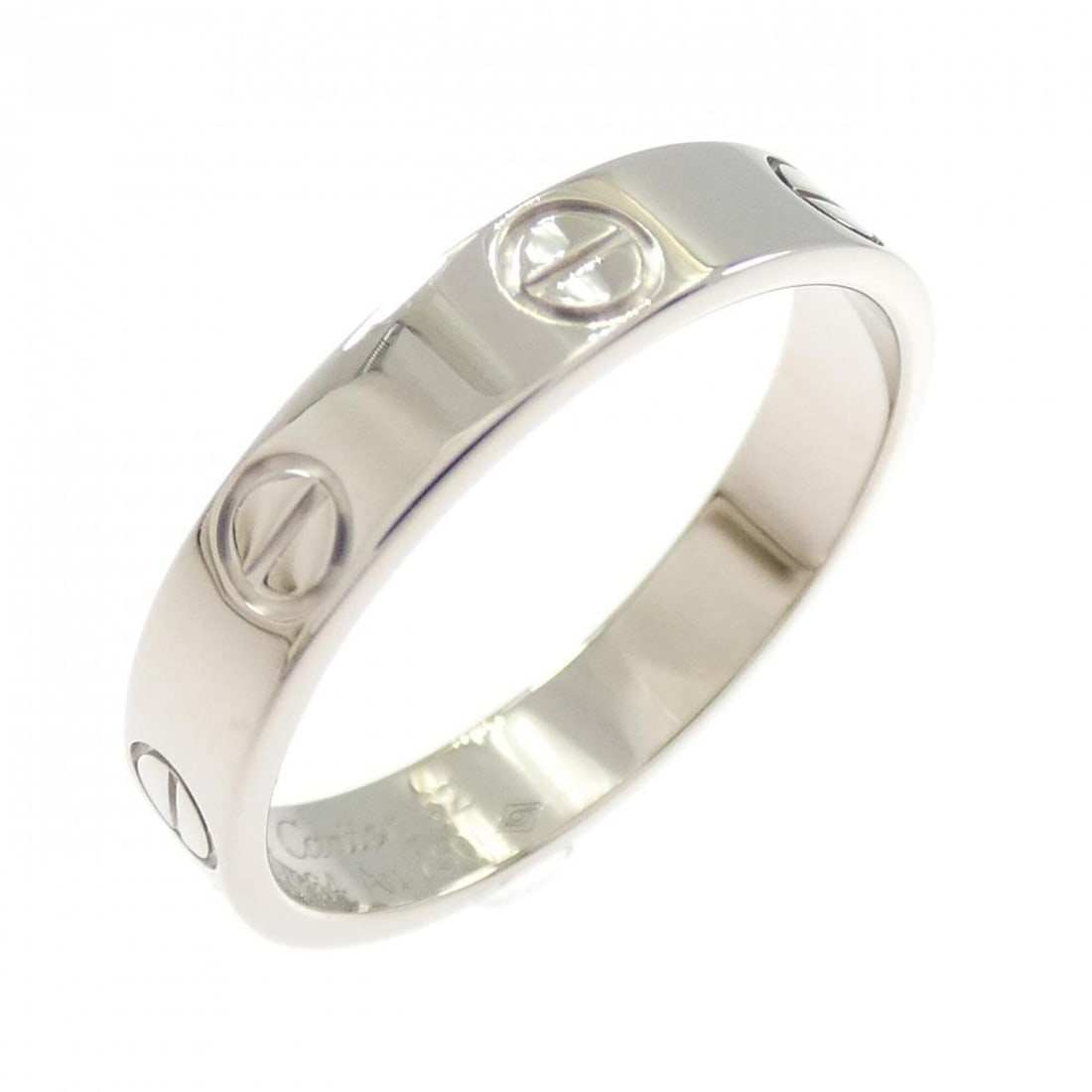 Cartier Mini Love Ring: --- Catalog ---Category: SizeUS Size: 6.5Brand Size: 52Category: DesignType: Band ringGender: WomenMaterial: White gold (18K)Category: GeneralMPN: B4085100Brand: Cartier--- Item List ---Section: