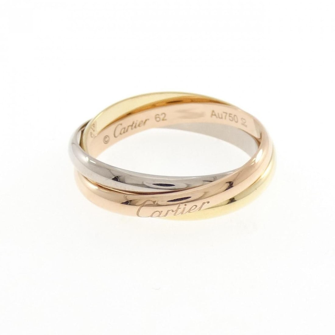 Cartier Trinity Ring: --- Catalog ---Category: SizeUS Size: 10.5Brand Size: 62Category: DesignType: Band ringGender: WomenMaterial: Pink gold (18K), White gold (18K), Yellow gold (18K)Category: GeneralMPN: B4086100Brand: C
