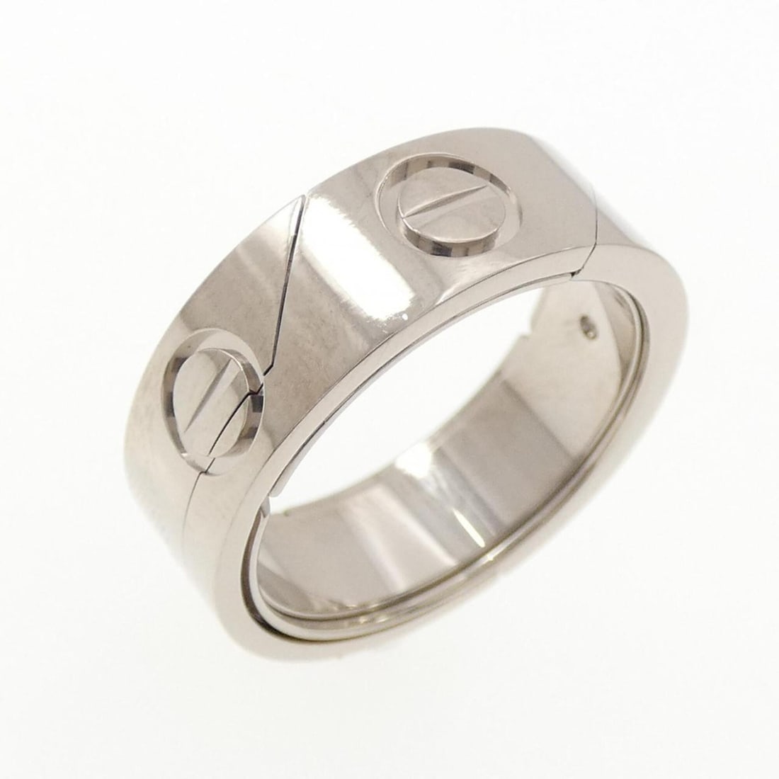 Cartier Astro Love 1999 Christmas Limited Edition Ring: --- Catalog ---Category: SizeUS Size: 7.5Brand Size: 55Category: DesignType: Band ringGender: WomenMaterial: White gold (18K)Category: GeneralMPN: B40393Brand: Cartier--- Item List ---Section: