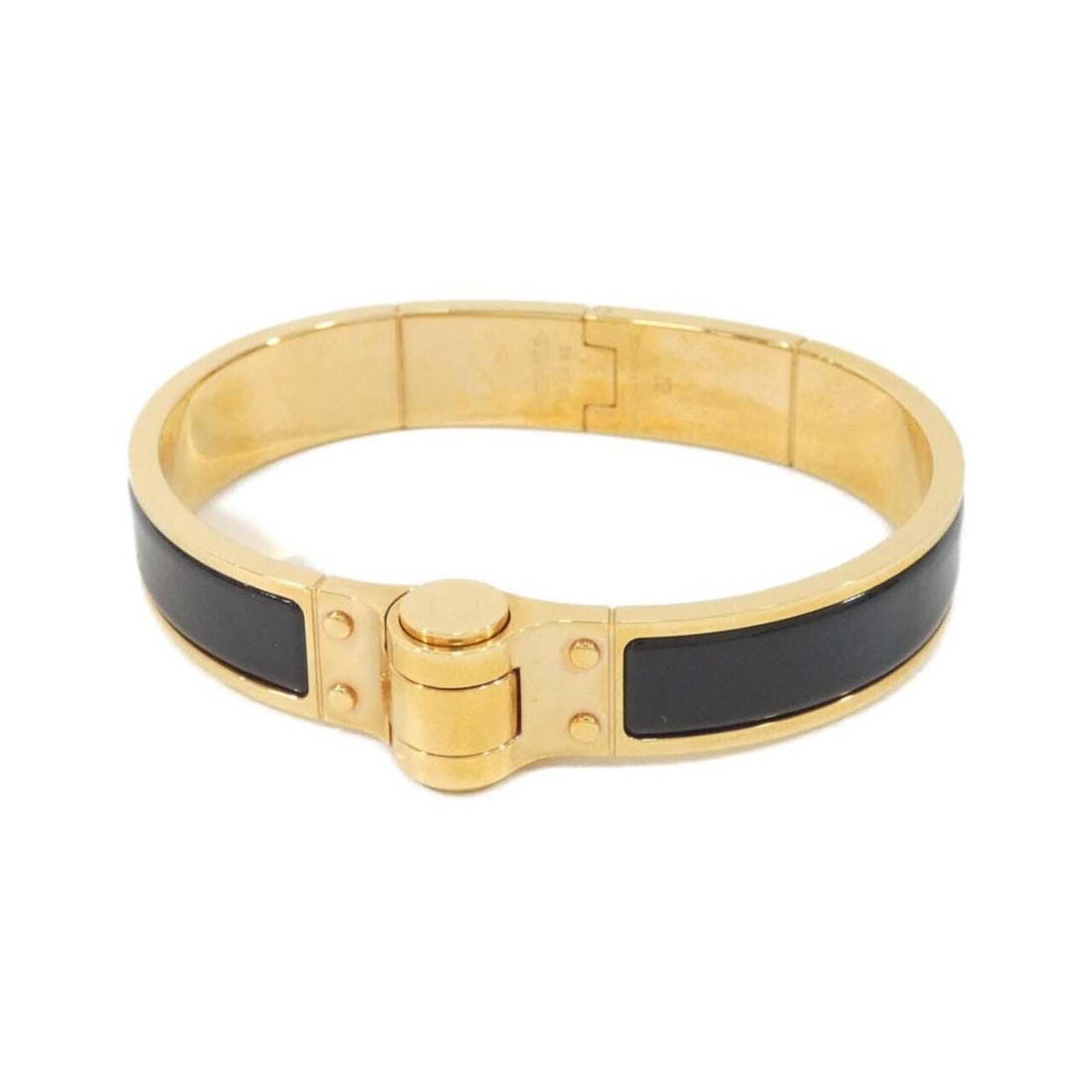 Hermes Hermès Charnière Uni 510001F Bracelet: --- Catalog ---Category: SizeWidth: 1.2cm / 0.47''Length: 18cm / 7.08''Category: DesignType: Charm braceletColor: Black, GoldGender: Women,MenCategory: GeneralMPN: 510001FBrand: Hermes--- Item List --